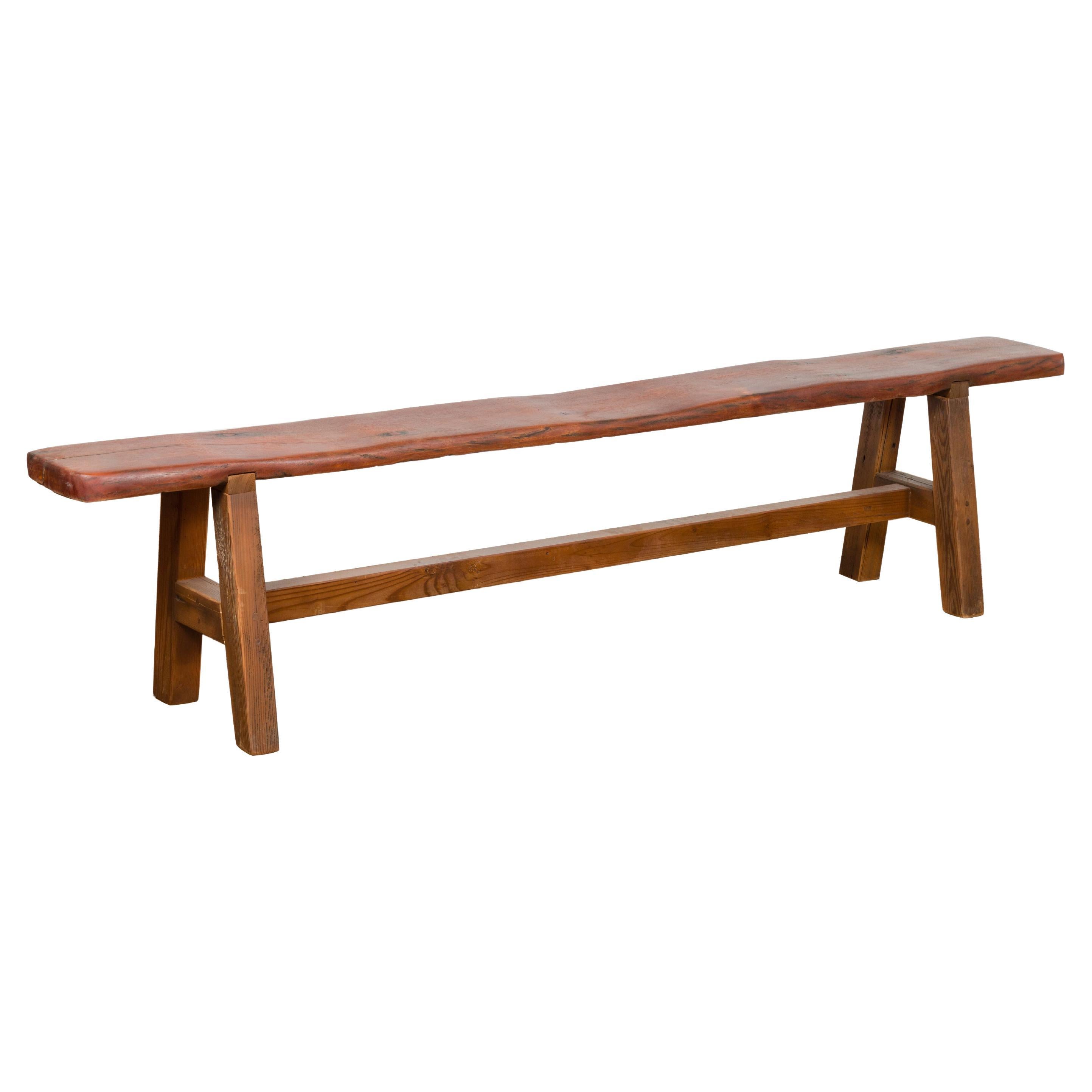 Rustic Long A-Frame Wooden Bench with Cross Stretcher and Splaying Legs For Sale