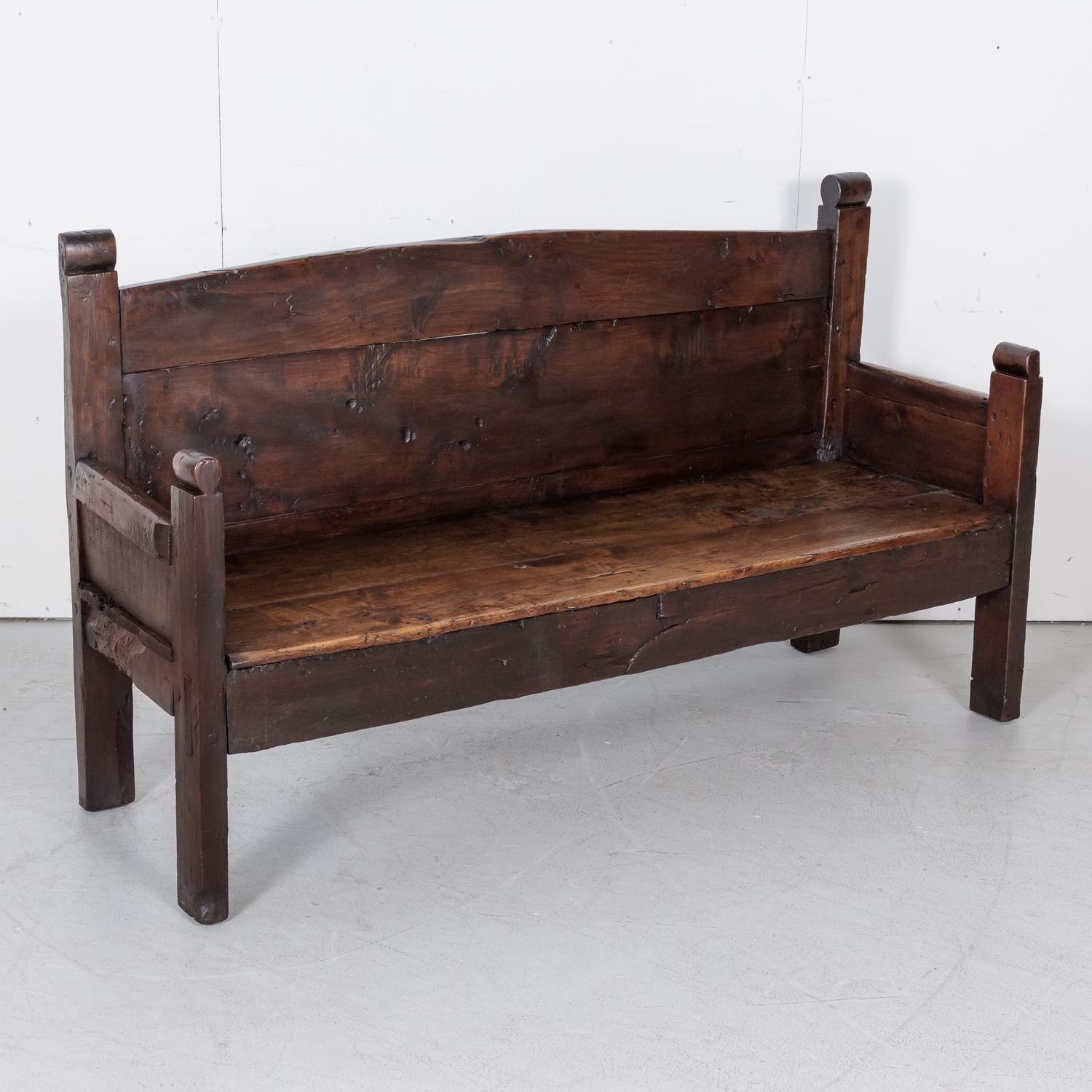 Rustic Mid-18th Century Spanish Walnut Bench with Arms 1