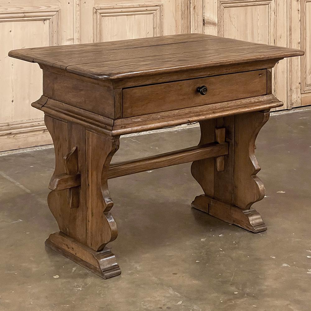 Rustic mid-19th century Spanish end table was completely hand-crafted from old-growth oak to last for centuries! Solid planks with rounded corners form the top, with a sturdy plank casework below that houses a surprisingly capacious single drawer