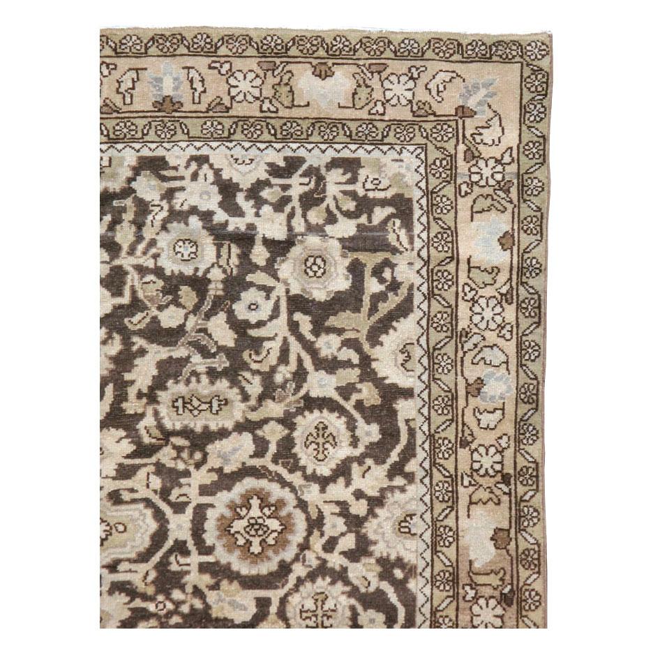 A vintage Persian Malayer accent rug in gallery format handmade during the mid-20th century with a rustic design in brown, slate, and cream tones.

Measures: 5' 2