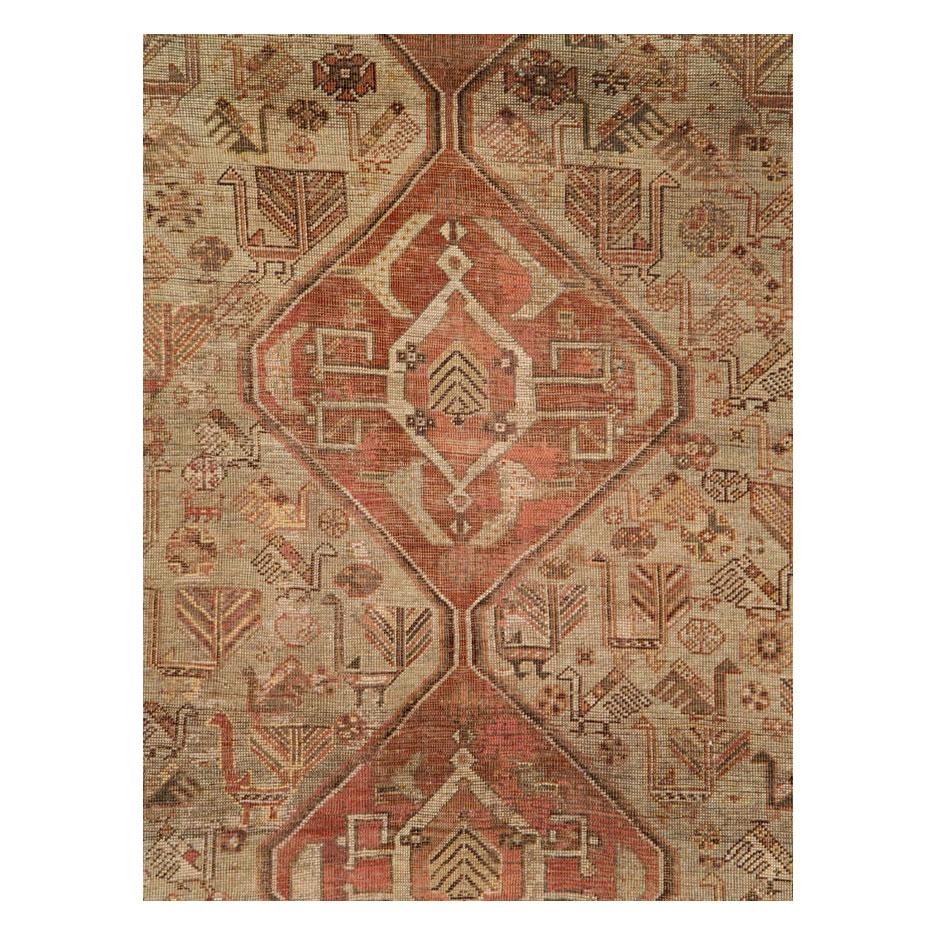 Hand-Knotted Rustic Mid-20th Century Handmade Distressed Persian Shiraz Accent Rug For Sale