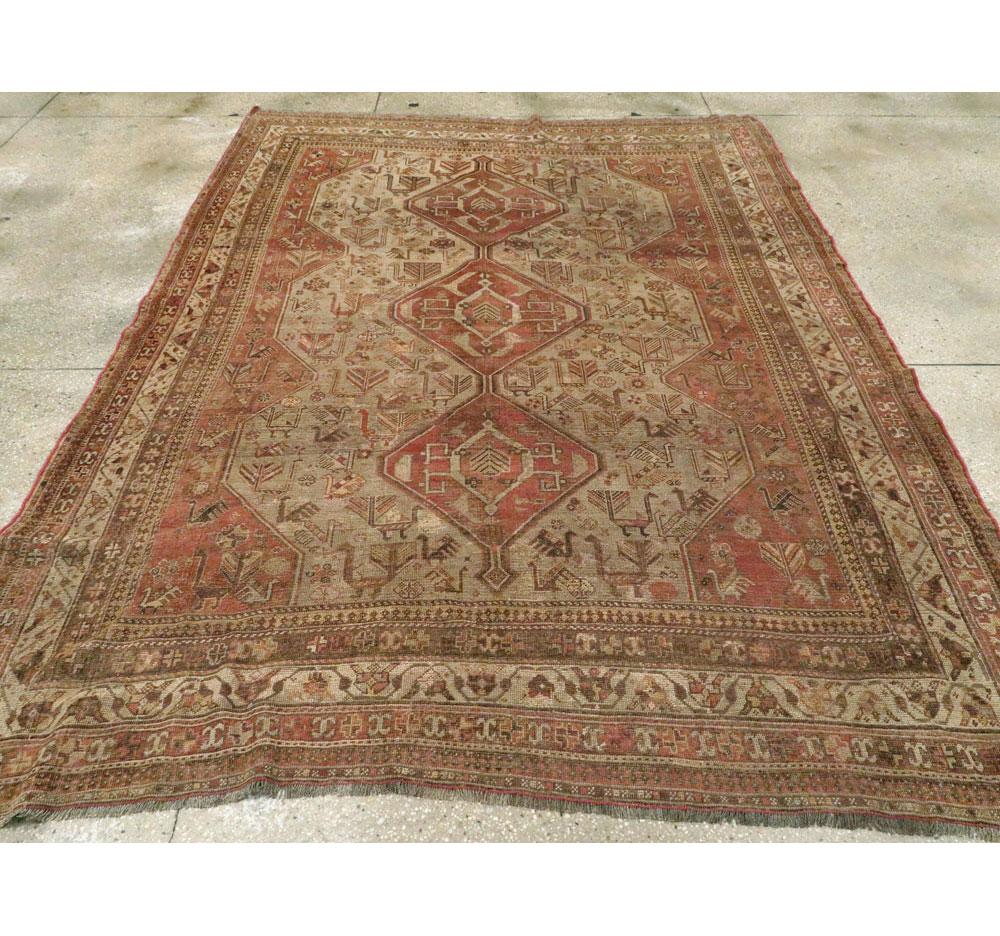 Wool Rustic Mid-20th Century Handmade Distressed Persian Shiraz Accent Rug For Sale