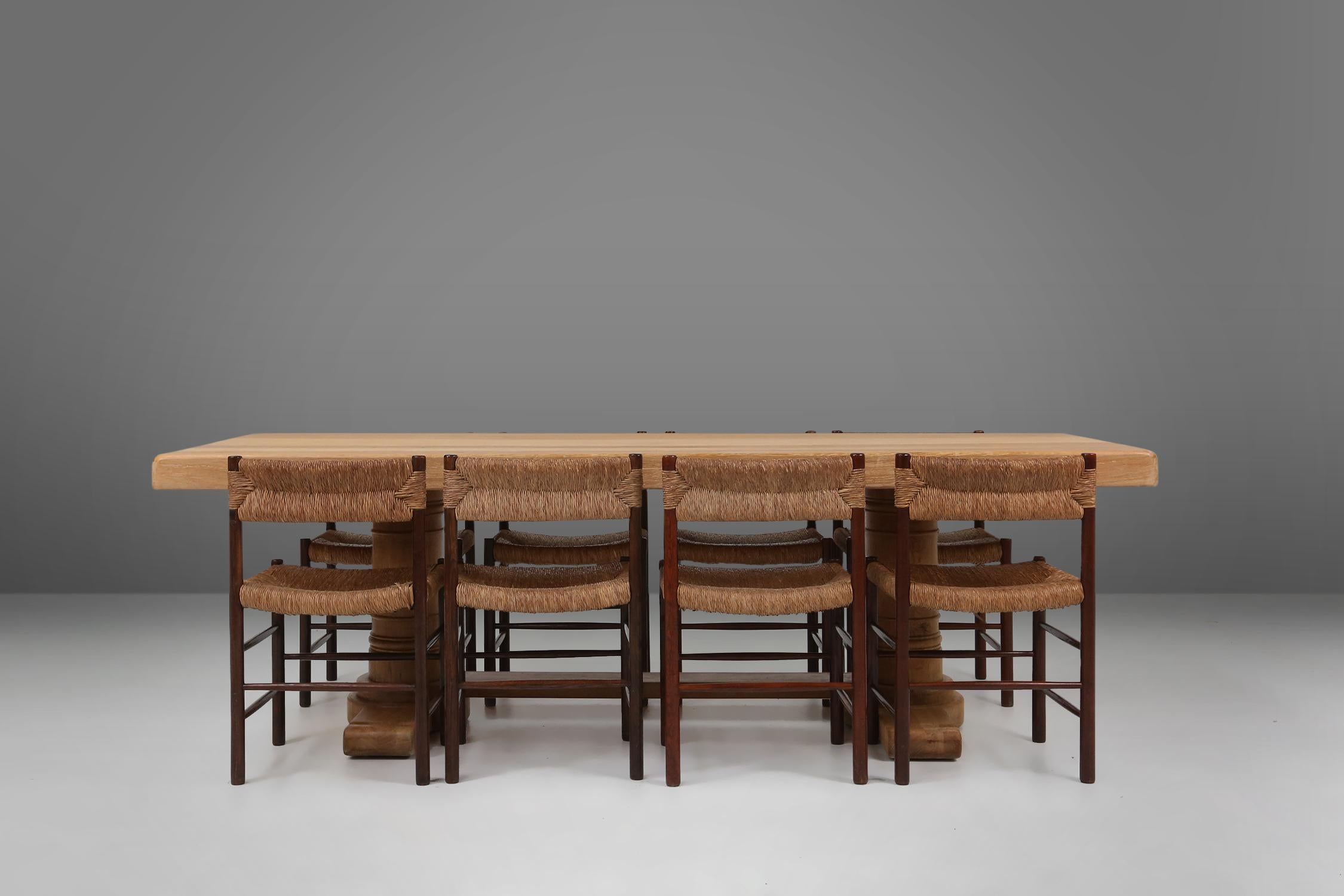 France / 1950s / table / oak wood / mid-century / rustic

A stunning French mid-century dining table in blond oak, designed in the fifties. Its impressive sculptured base and robust thick top make this piece an artistic statement of design. This