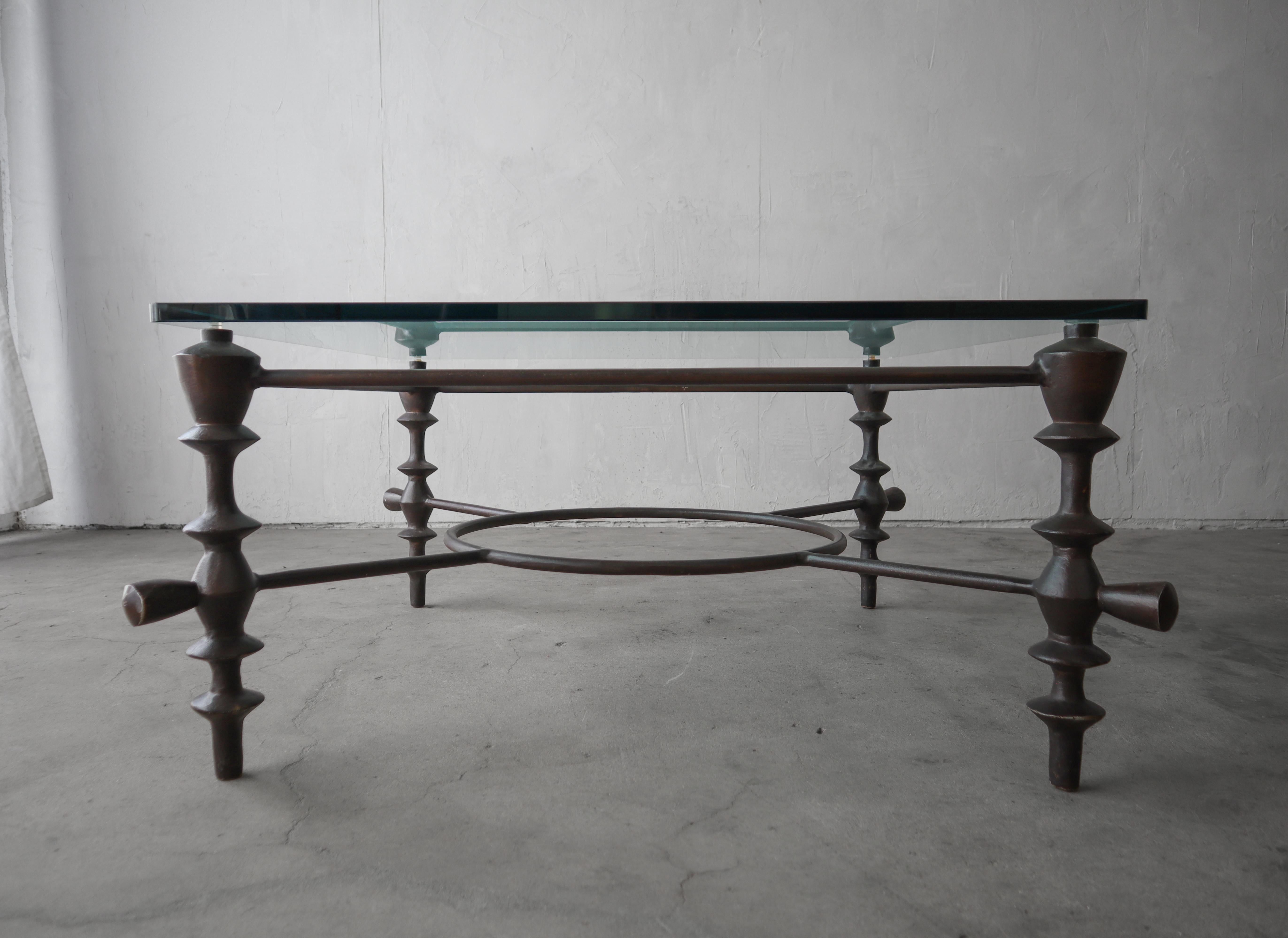 Minimalist Giacometti Style Bronzed Finish and Glass Coffee Table For Sale