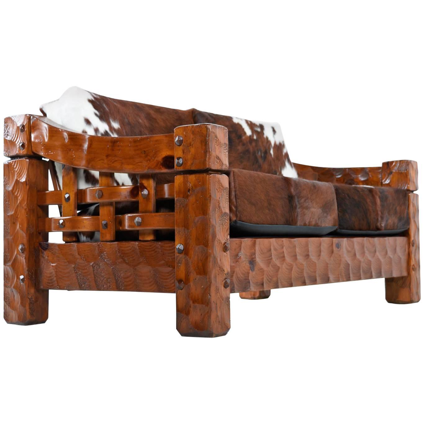 Rustic modern is the best way we can describe this truly unique loveseat sofa. Don't expect to ever see anything like this again. We have the entire living room set and can assure this is not the sort of stuff that pops up often. Made by Null