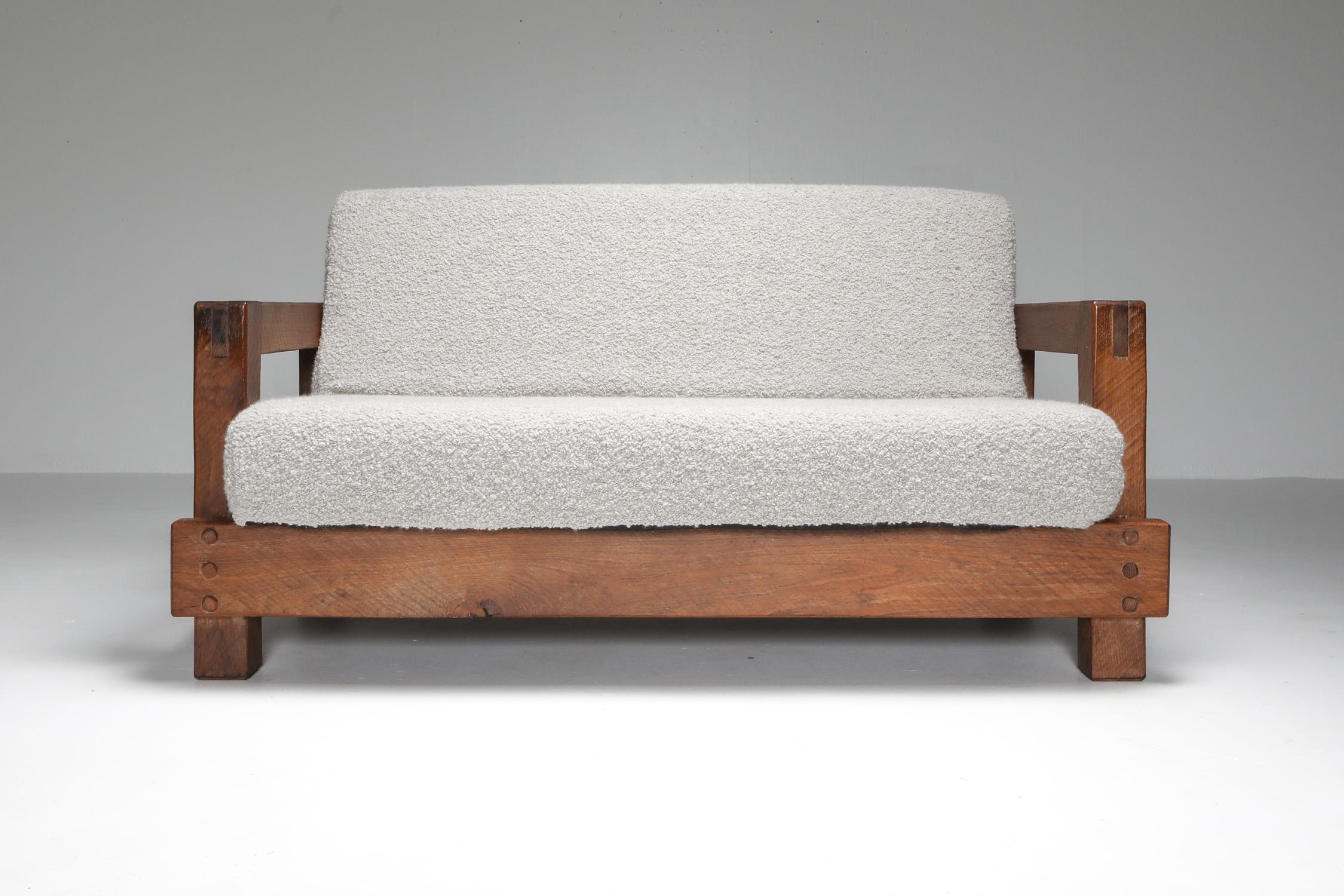 Rustic modern two-seat, bouclé wool, Pierre Frey

Chalet style wabi sabi loveseat sofa in solid oak
Would fit well in an Axel Vervoordt inspired decor.

   

   