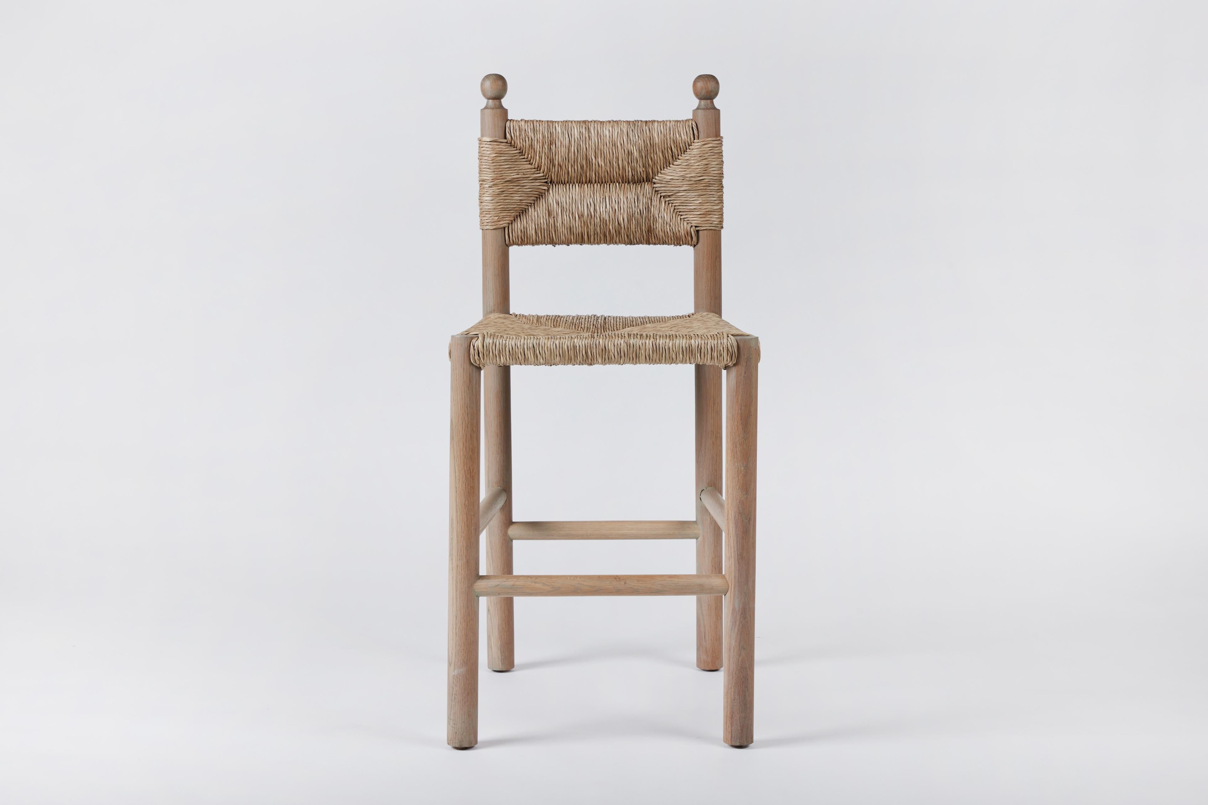 Martin & Brockett’s Sydney Counter Chair features a wood frame with a rush seat and back with finial details on the chair back.

H 40.5 in. x D 20 in. x W 18 in. Seat Height 24.5 in.

Available in additional finishes & sizes.

Part of our Sydney