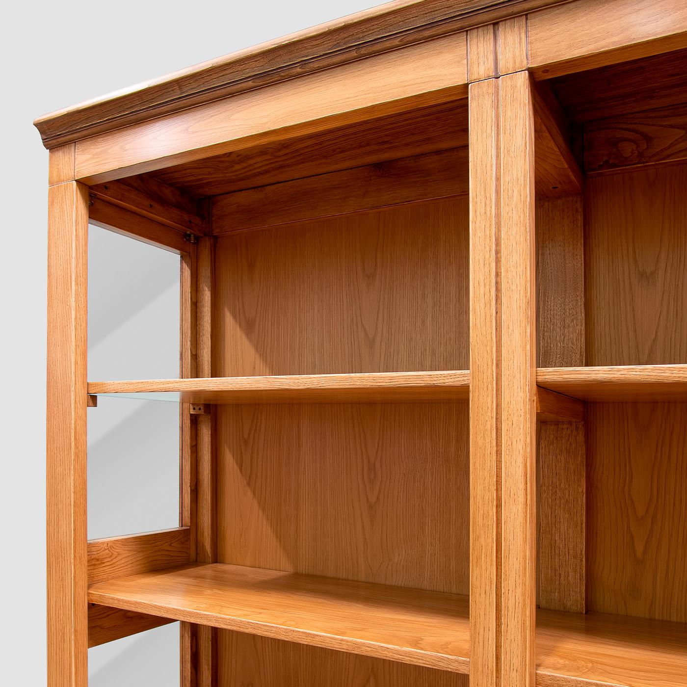 Perfect for embellishing a bare wall in any rustic-chic decor, this modular bookcase is a showcase of cabinetry mastery. The minimal details allow the chestnut's rich grain to take center stage, emphasized by water-based lacquers and hand-applied