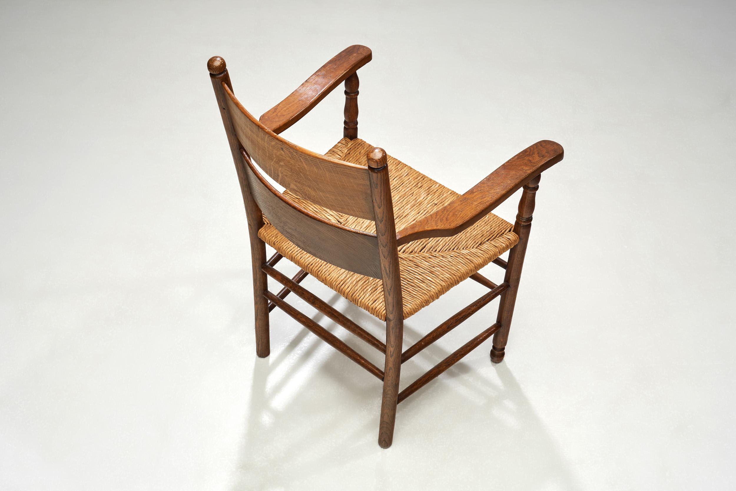 Mid-20th Century Rustic Oak and Rush Armchair, Europe 1930s For Sale