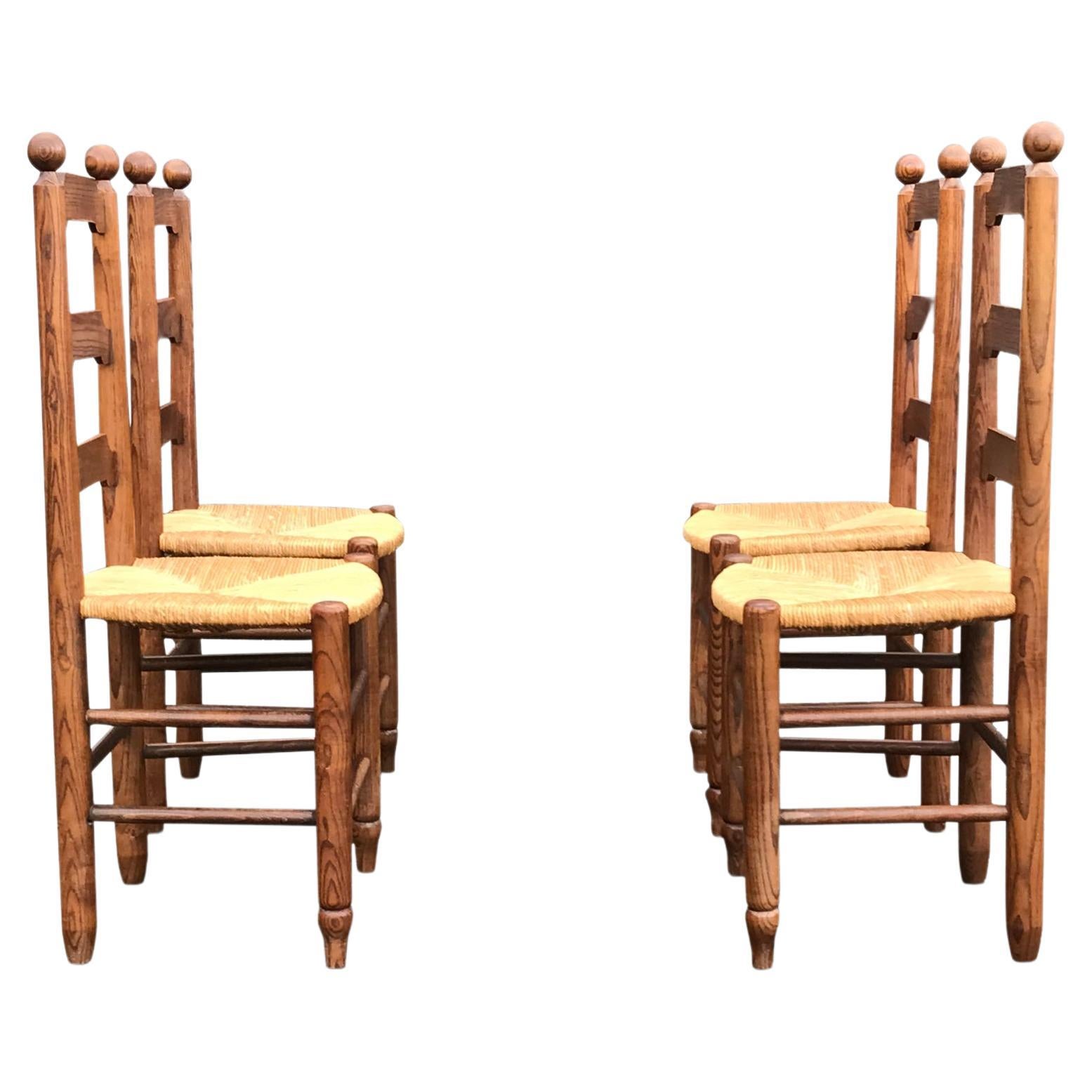 Rustic oak and wicker dining chair Georges Robert France 1960s, set of 4 For Sale