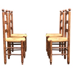 Rustic oak and wicker dining chair Georges Robert France 1960s, set of 4