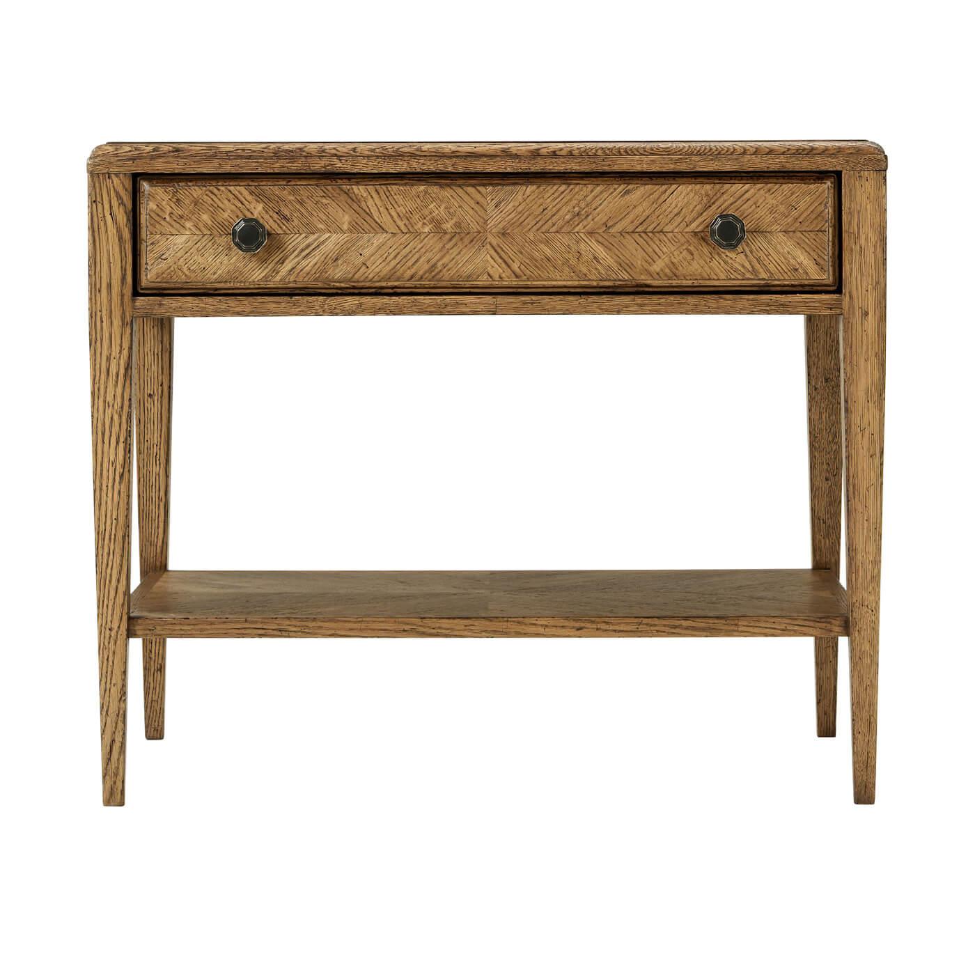 A rustic oak end table with oak parquetry patterned top and bottom tier, highlighted by our Dawn finish and joined with a rustic tapered oak leg.
Shown in Dawn Finish
Dimensions
29