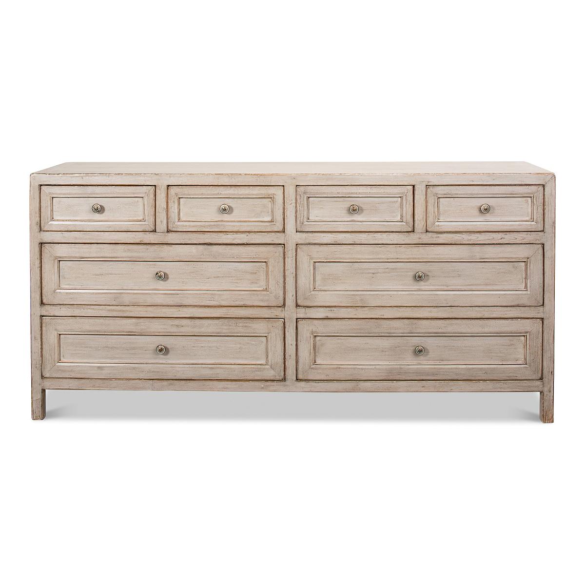 A Rustic painted eight-drawer dresser. Reclaimed pine painted and distressed with four short and four long drawers. Influenced by antique Chinese furniture, this dresser is ideal in modern or traditional settings.

Dimensions: 71