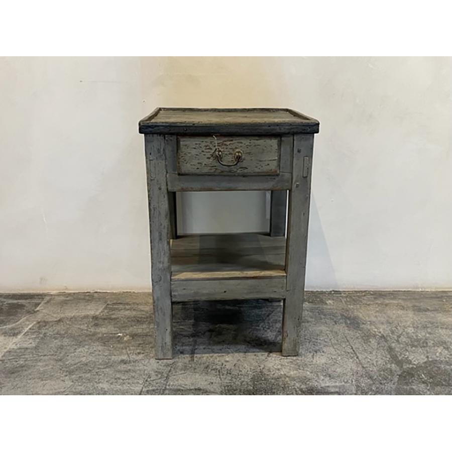 Rustic Painted end table, 19th century

A painted rustic, two-toned end table with drawer and shelf. The piece is constructed with mortise and tenon joints and a lipped top.The rustic patina and crackled paint are authentic to the piece which