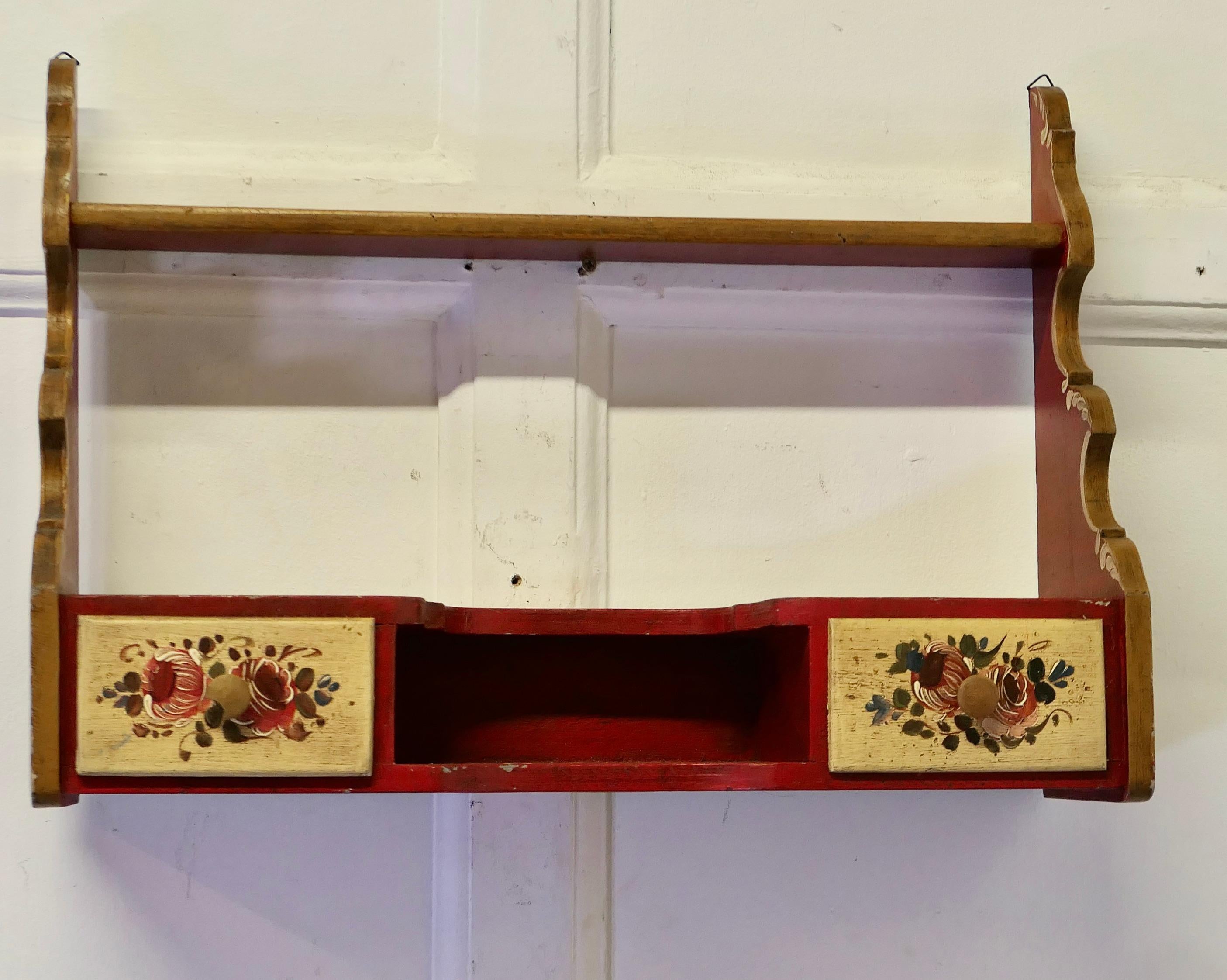 Rustic Painted Folk Art Wall Shelf with Drawers

This charming little wall hanging shelf has 2 small drawer and id hand painted in a Folk Art Style
The shelf is 14” high, 20” wide and 6” deep
FB74