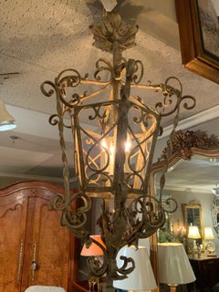 Rustic painted iron chandelier with three lights
