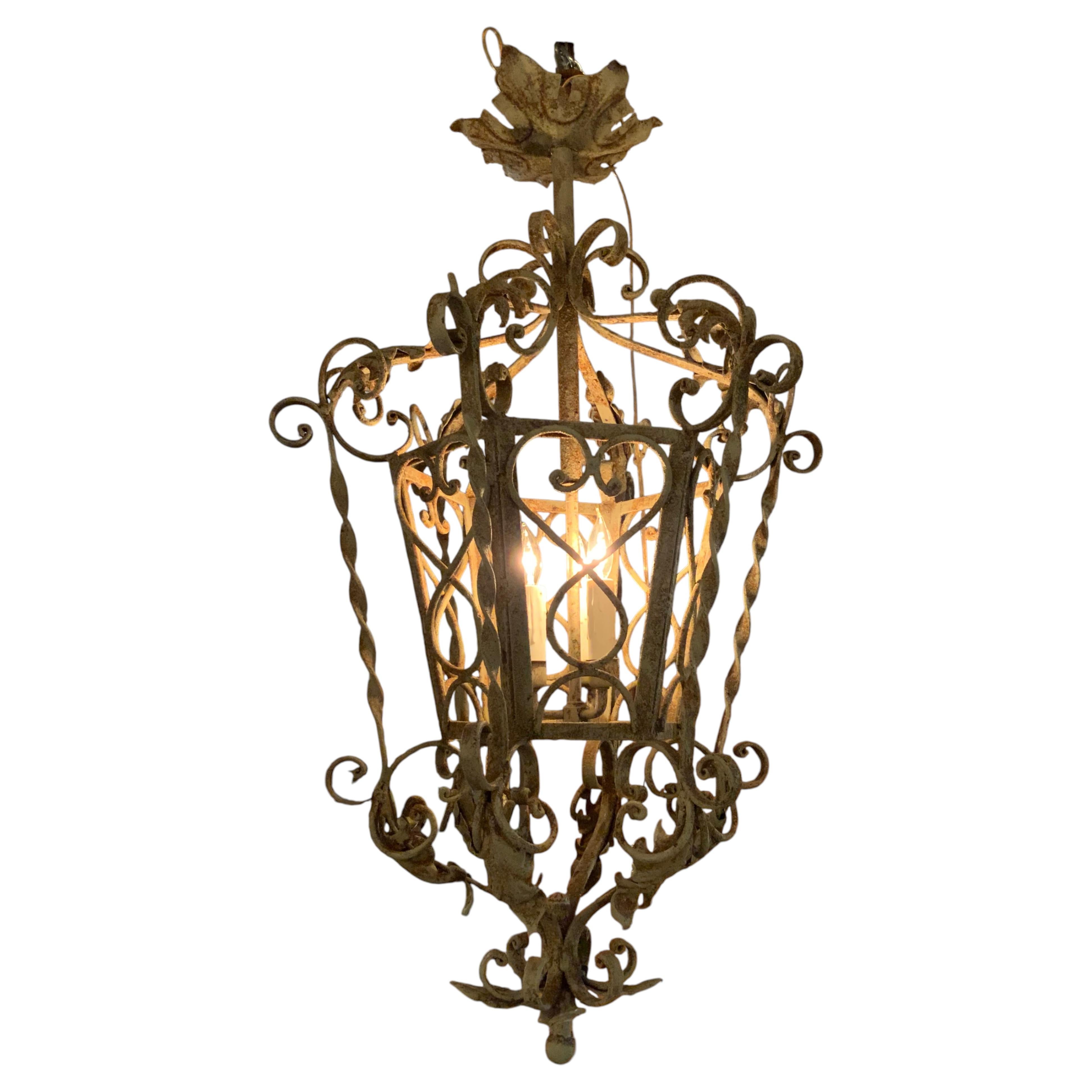 Rustic painted iron chandelier with three lights