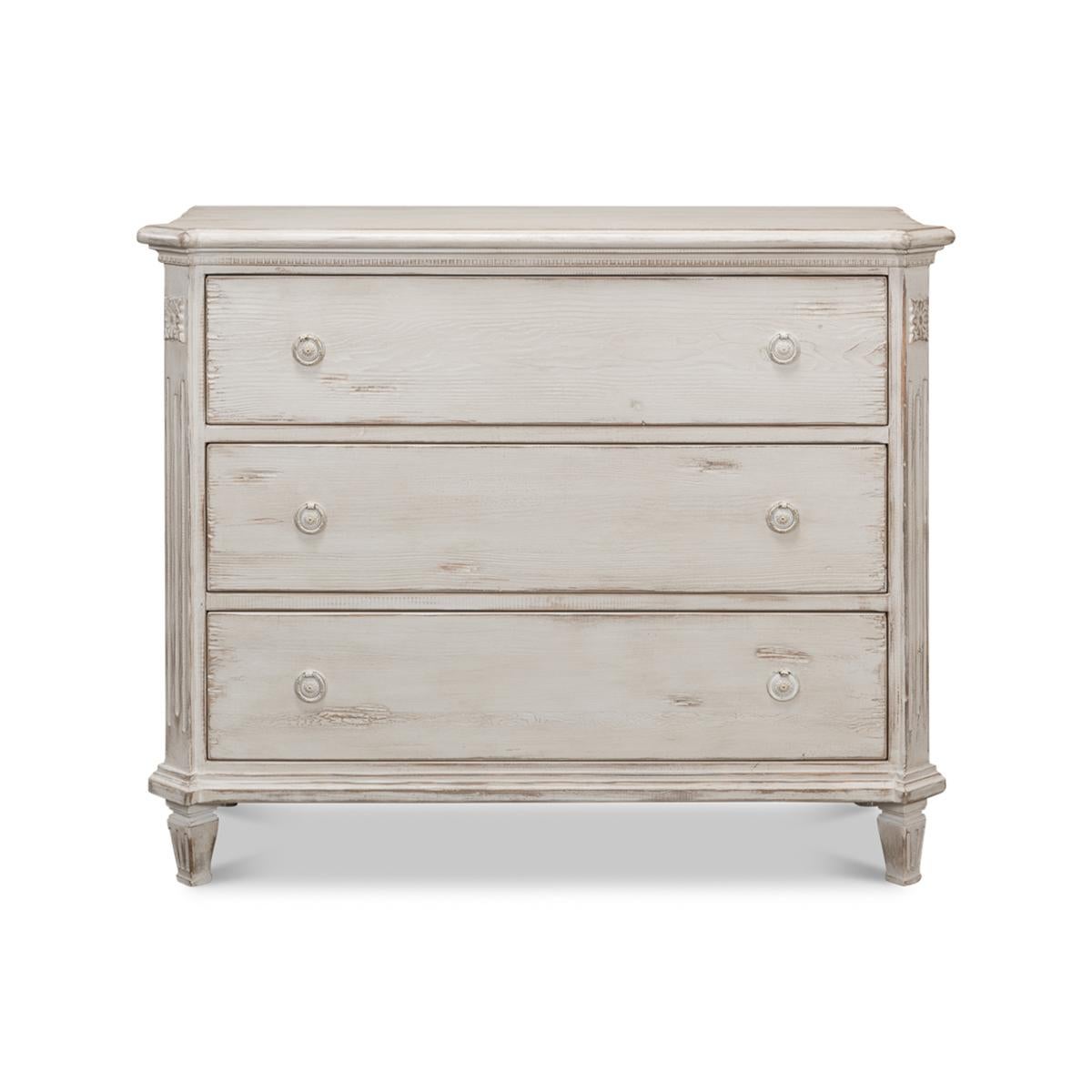 Made with reclaimed pine and finished in a lightly distressed soft gray paint. With a molded edge top having canted corners, fluted styles above square tapered and fluted legs.

Dimensions: 47
