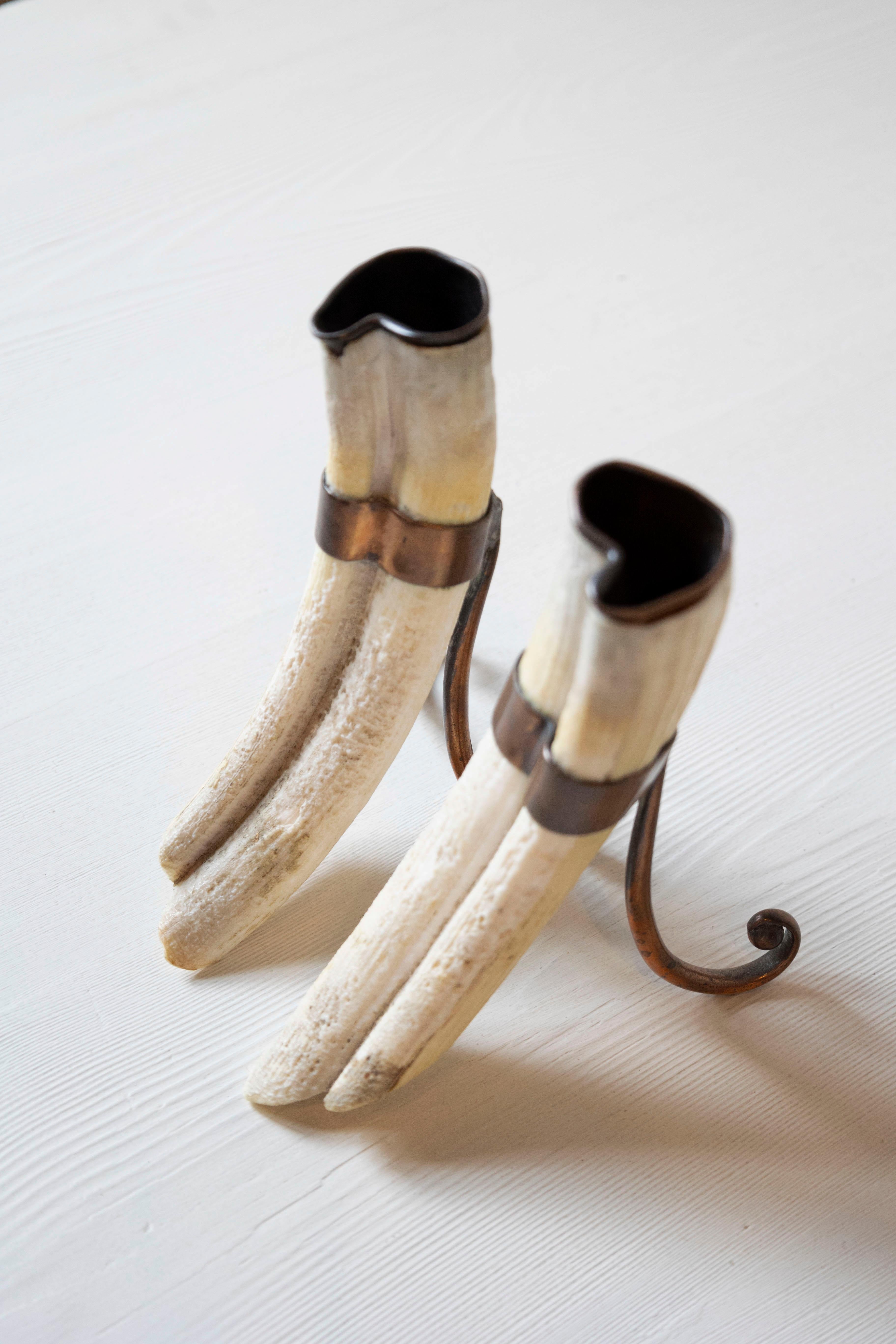 Rustic Pair of 19th Century Game Animal Horns Mounted on Scrolling Metal Stands in vendita 1