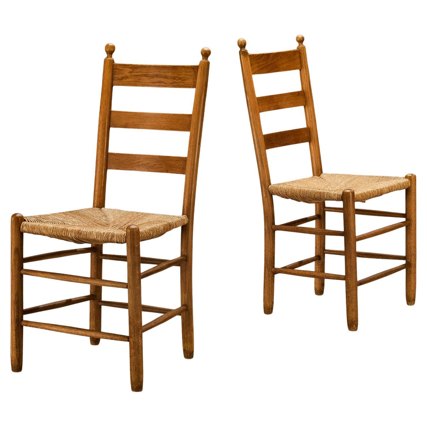 Rustic Pair of Dining Chairs in Solid Oak and Straw For Sale