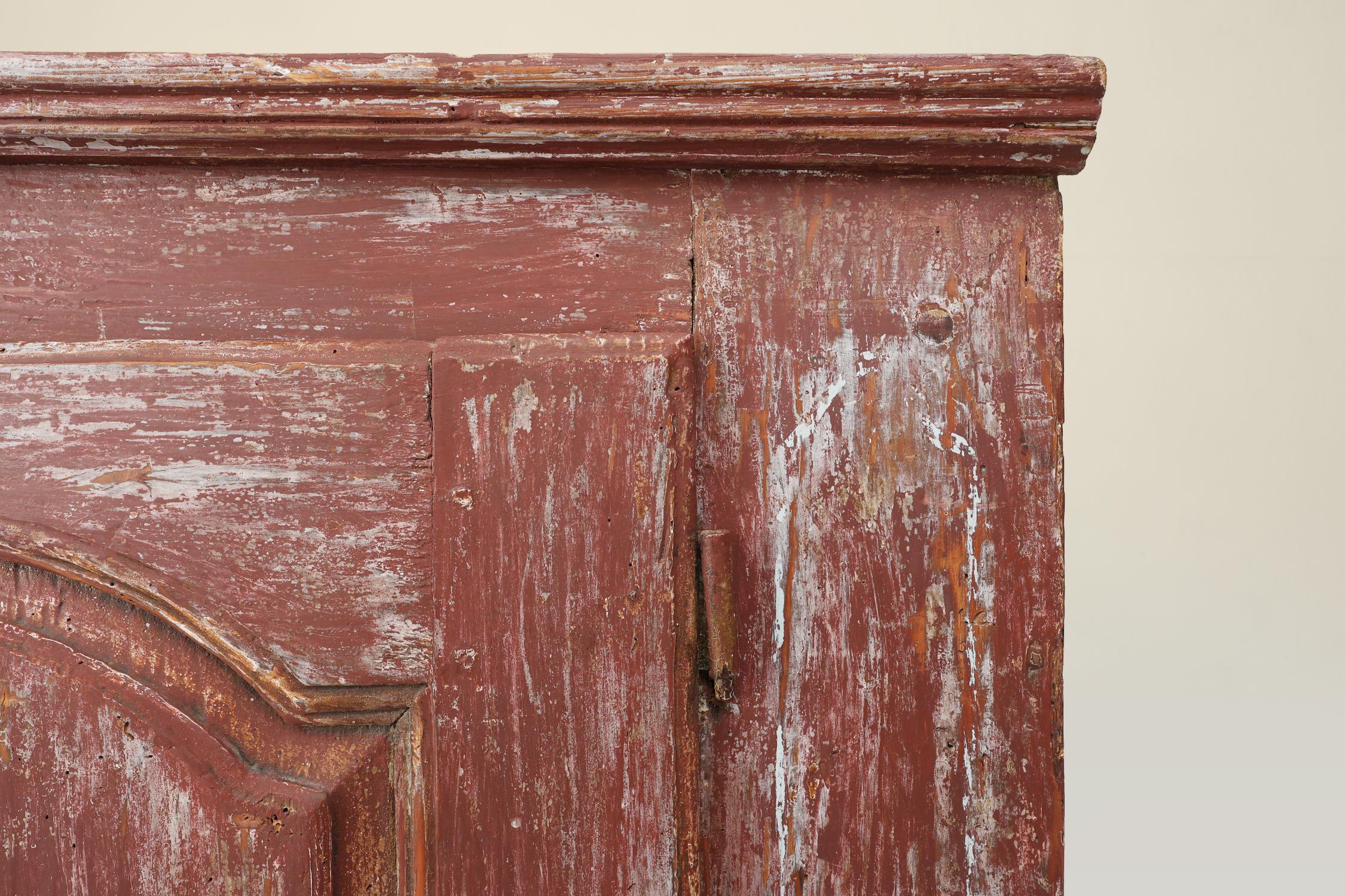 Rustic Parisian cabinet in pine wood with old burgundy paint layers, ca. 1820 For Sale 2