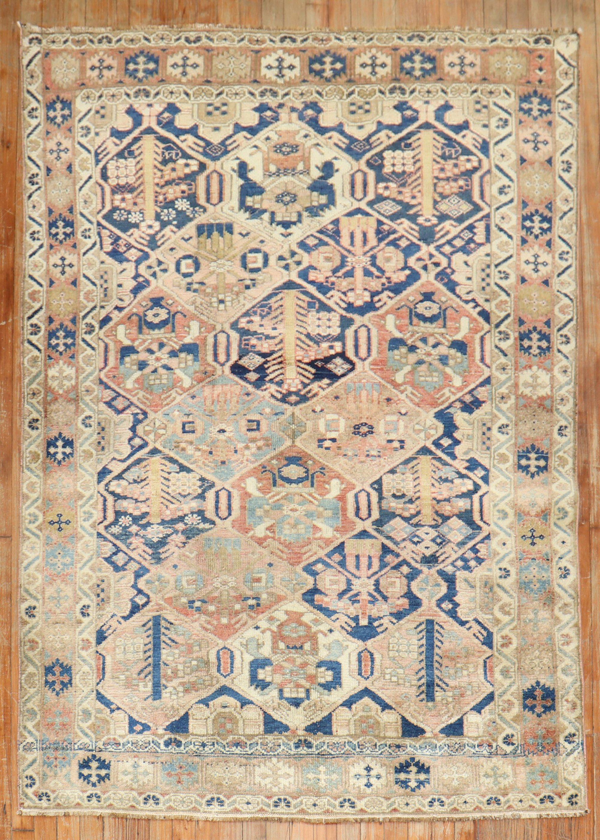 A traditional rustic color Persian Bakhtiari accent size rug,

circa 1940. Measures: 4'7