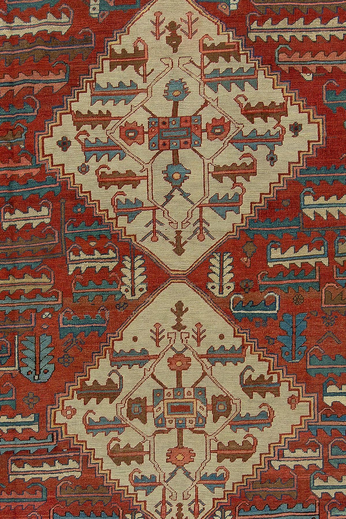 High collectible-quality large room size rust field triple medallion field early 20th century Persian Bakshaish rug. The harmonious colors, skillful geometry, and weavers craftsmanship make this rug an absolute work of art.

Measures: 11'3