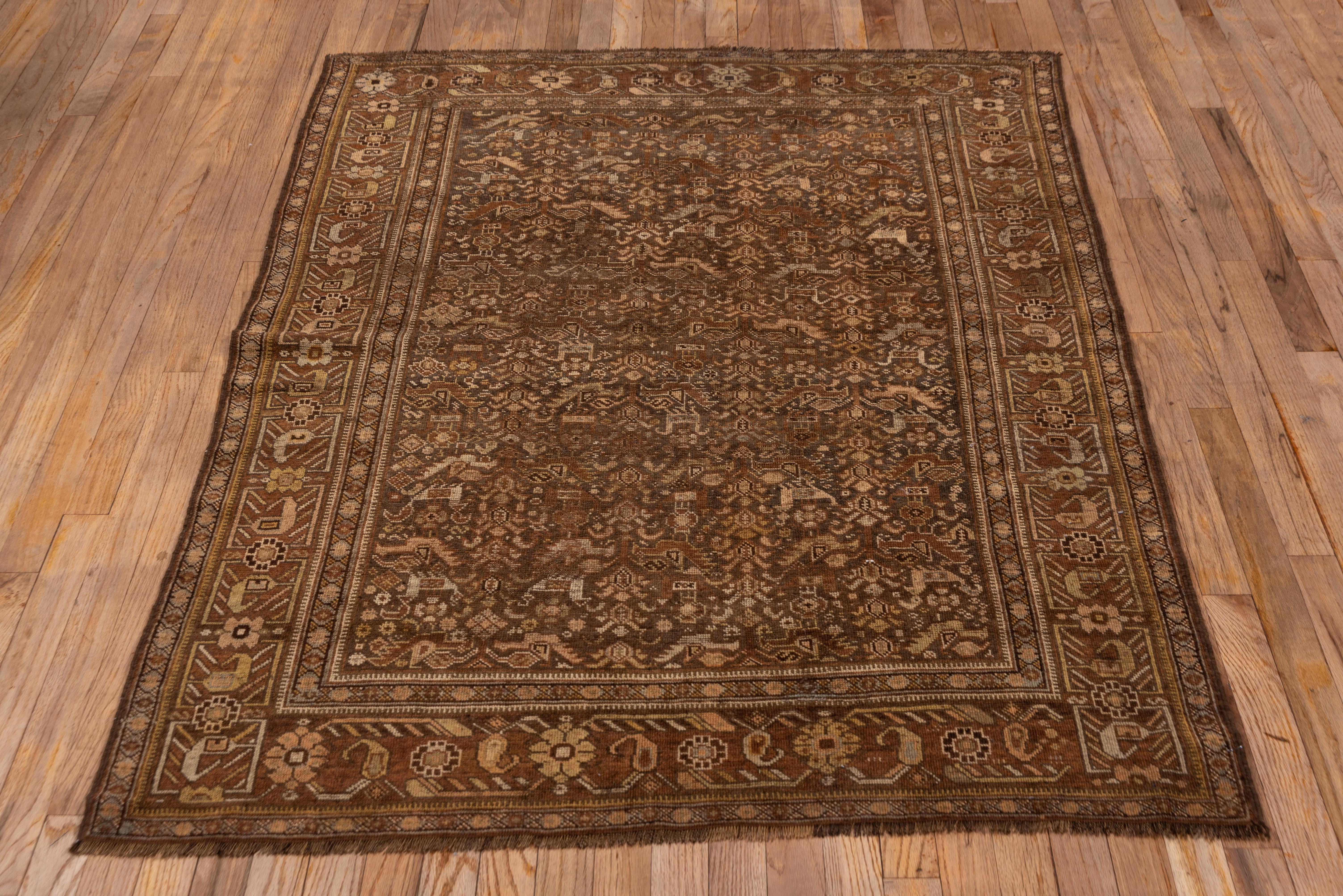 Hand-Knotted Rustic Persian Shiraz Pictorial Rug, Brown & Rust Tones, circa 1920s For Sale