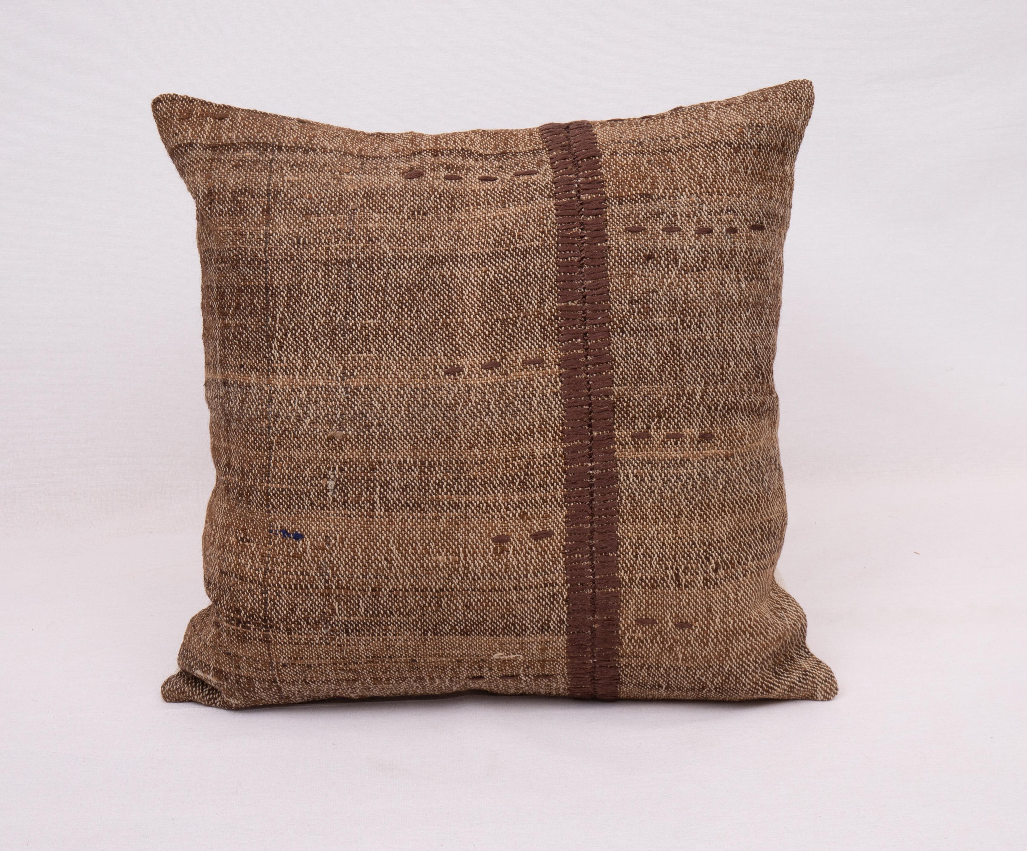 Rustic Pillow Case Made from a Vintage Un-Dyed Wool Coverlet, Mid 20th C


This pillow is made from a vintage coverlet that is hand woven using un-dyed wool. Our addition to the piece is silk hand stitching. It does not come with an insert. Linen