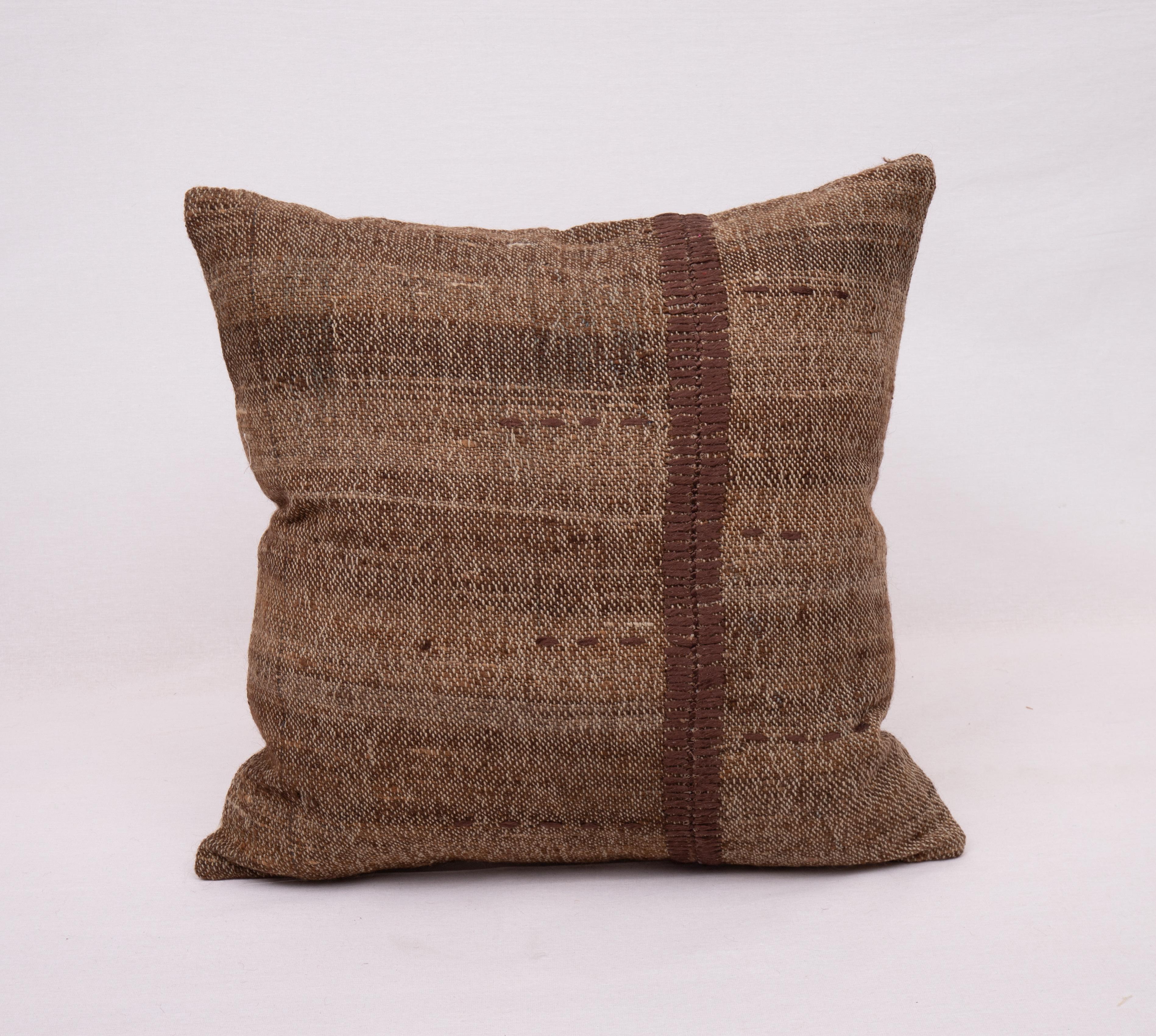 Rustic pillow case Made from a Vintage Un-Dyed Wool Coverlet, Mid 20th C


This pillow is made from a vintage coverlet that is hand woven using un-dyed wool. Our addition to the piece is silk hand stitching. It does not come with an insert. Linen