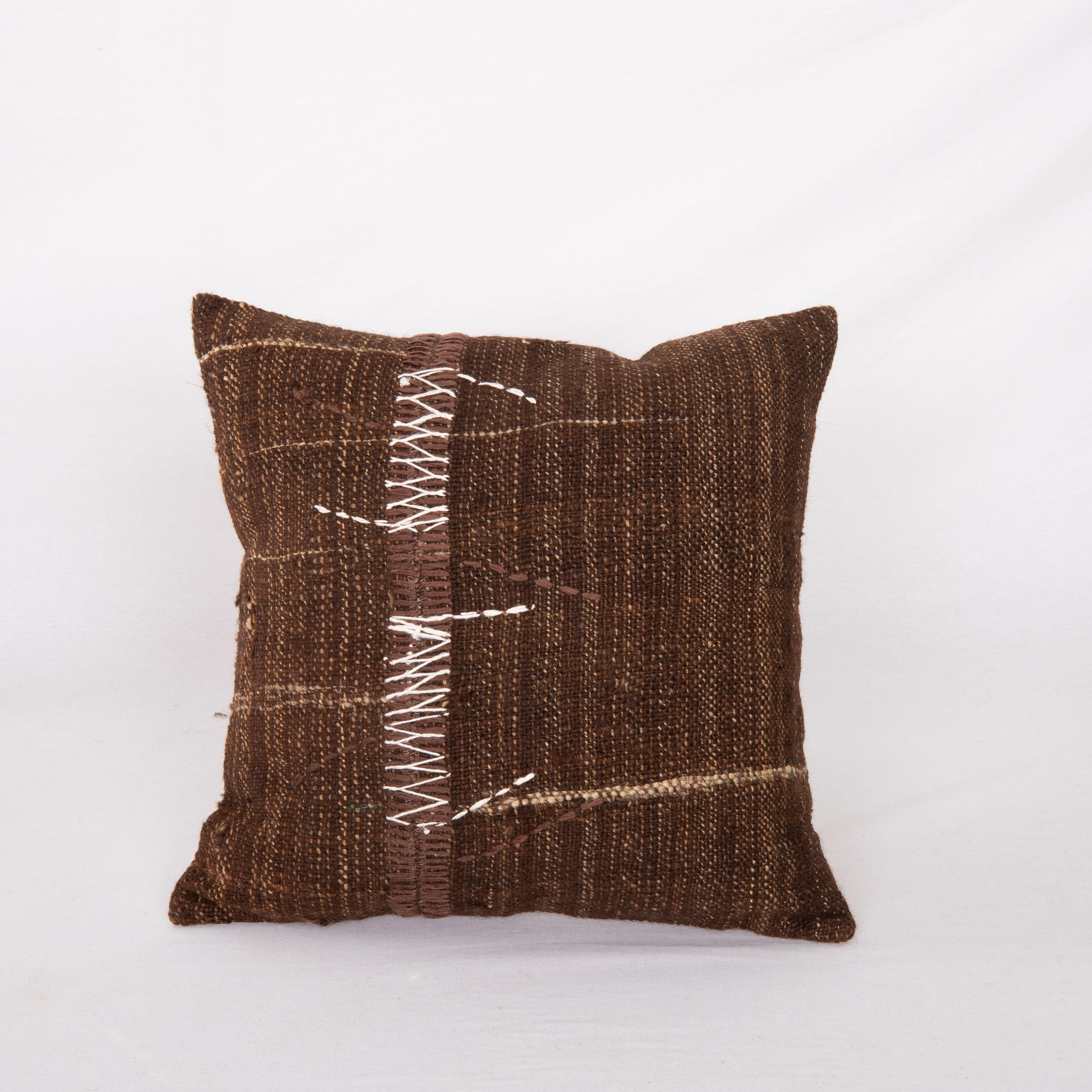 Rustic pillow case made from a vintage Un-Dyed wool coverlet, Mid 20th C


This pillow is made from a vintage coverlet that is hand woven using un-dyed wool. Our addition to the piece is silk hand stitching. It does not come with an insert. Linen in
