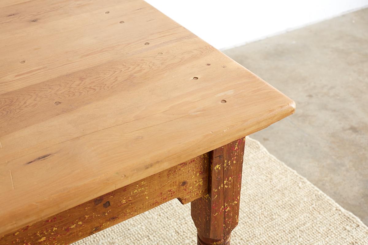 Rustic Pine Farm Table with Old Paint Remnants 9