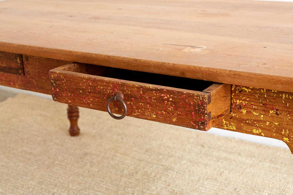 Rustic Pine Farm Table with Old Paint Remnants 1