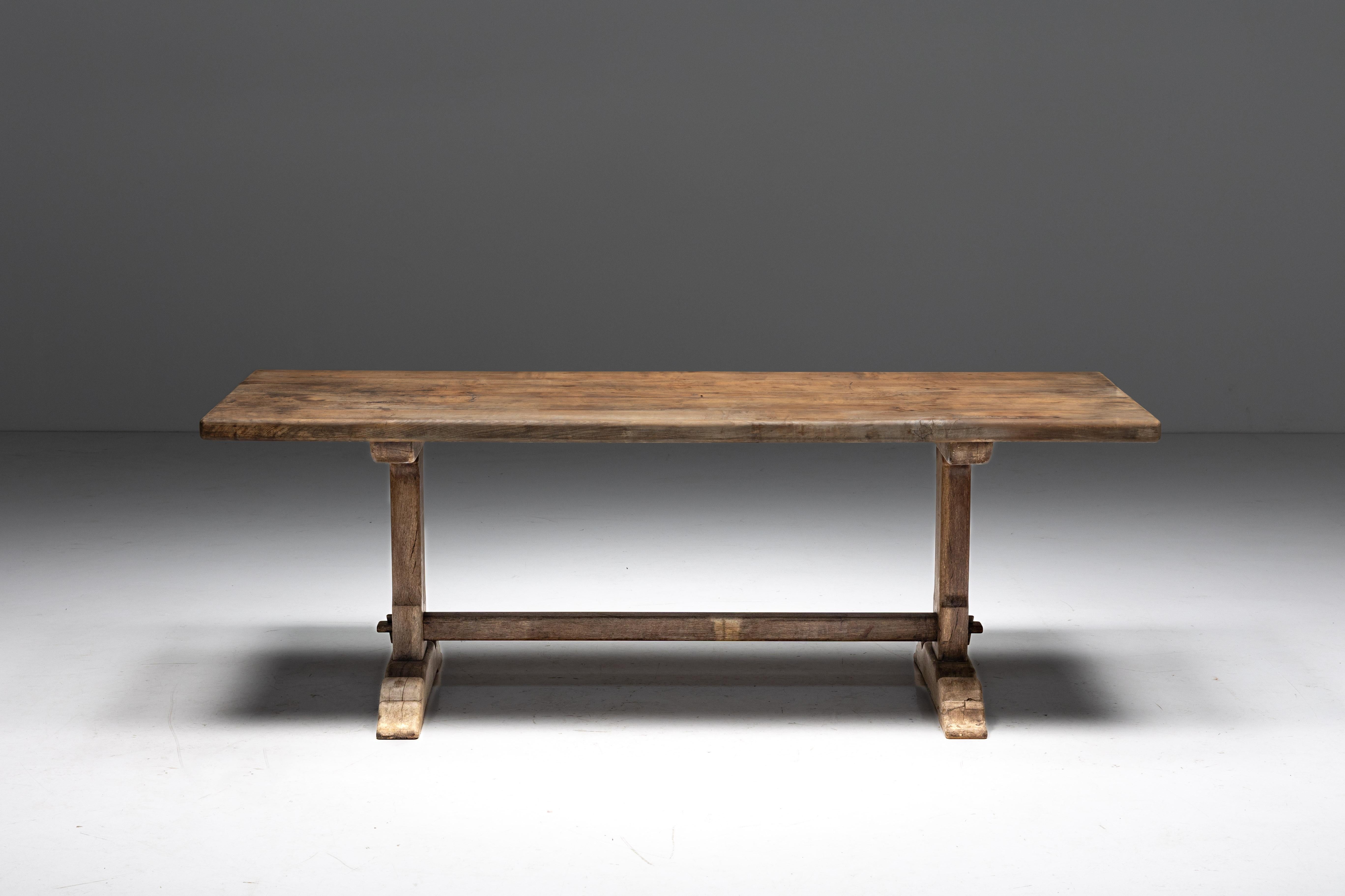 Rustic; Art Populaire; Dining Table; 19th Century; France; Folk Art; Wabi Sabi; Robust; Brutalist Design; Arts & Crafts;

Rustic dining table, originating from the 19th century, showcasing a thick tabletop, meticulously crafted from robust oak wood.