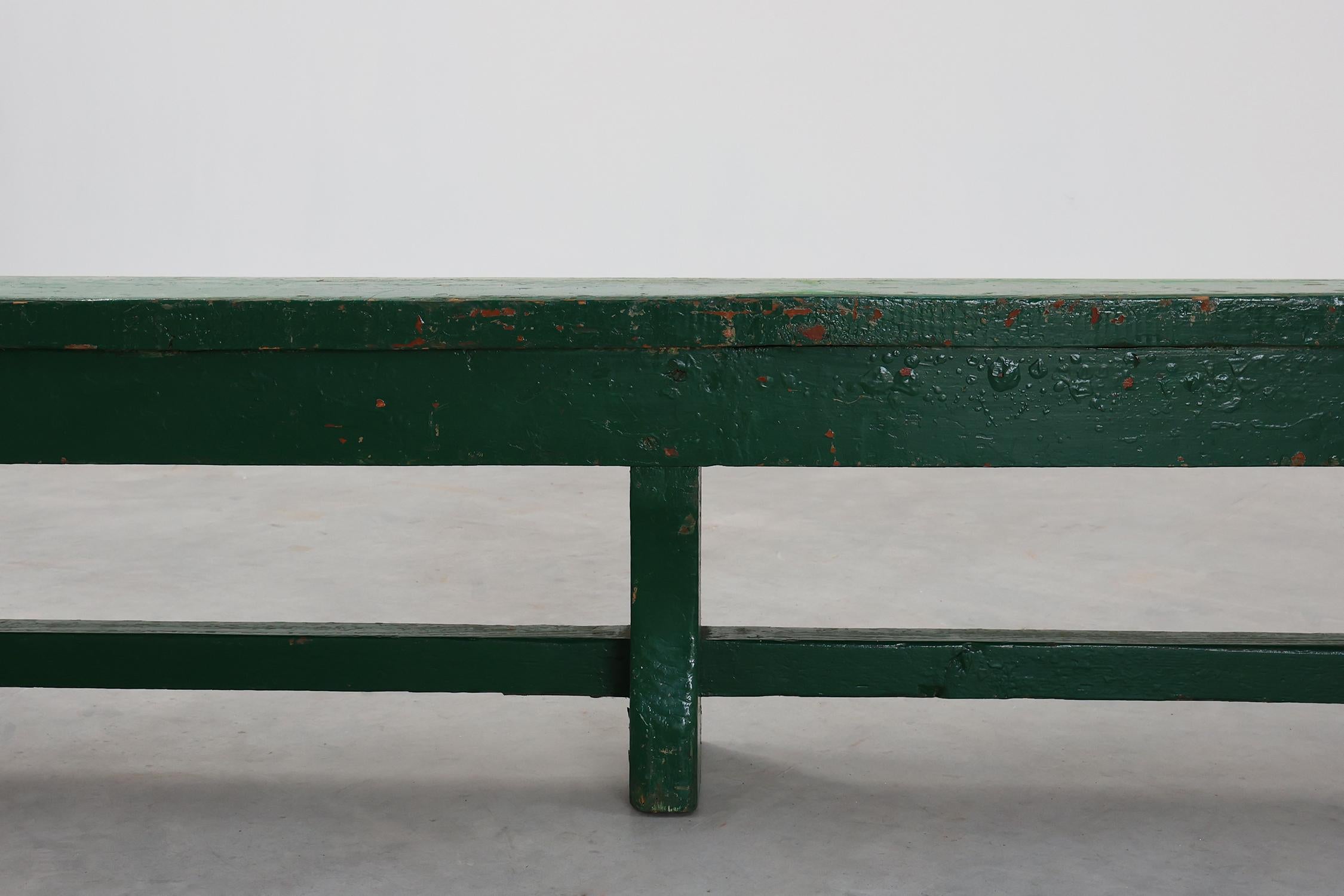 Early 20th Century Rustic primitive green farmhouse bench in solid oak, France ca. 1900 For Sale