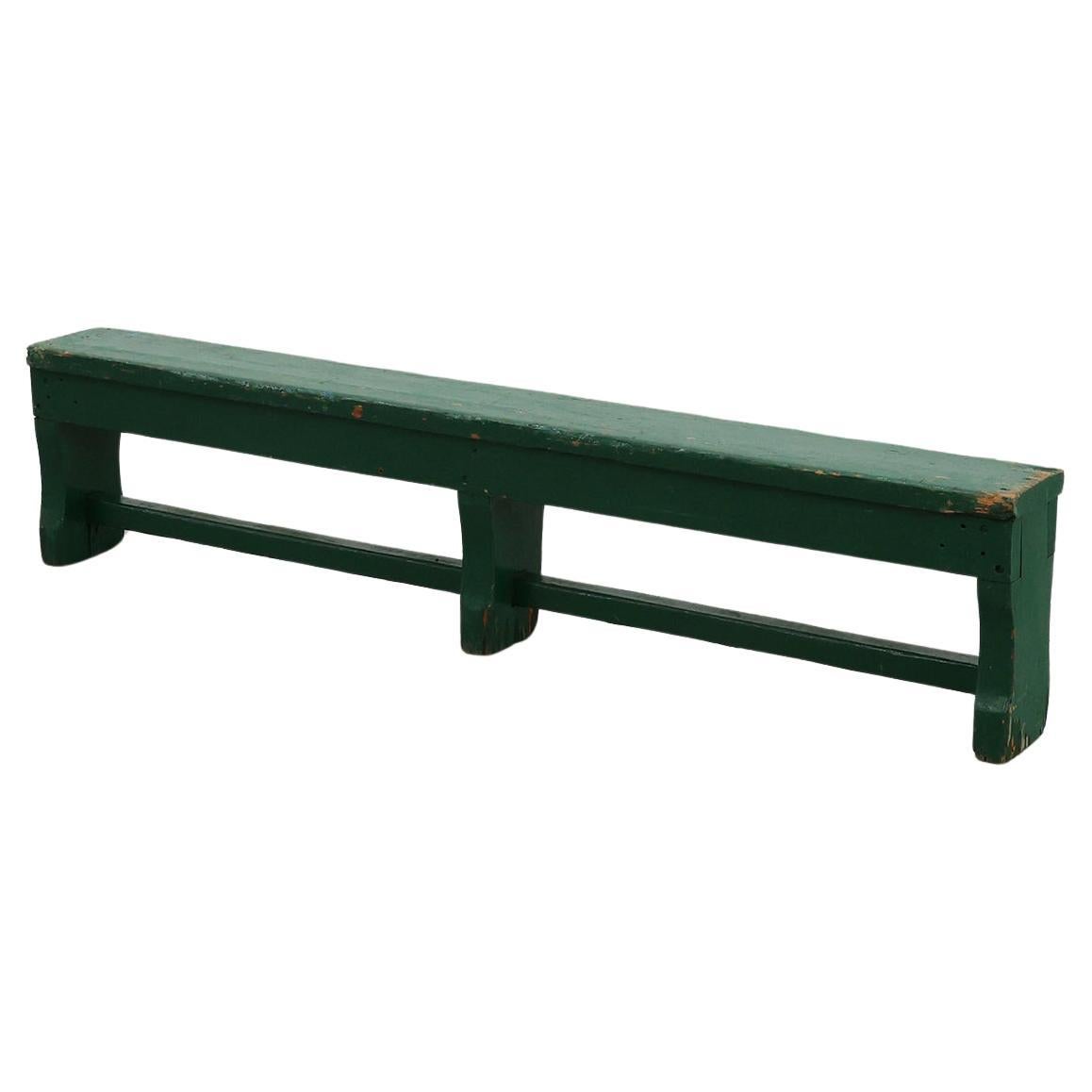 Rustic primitive green farmhouse bench in solid oak, France ca. 1900
