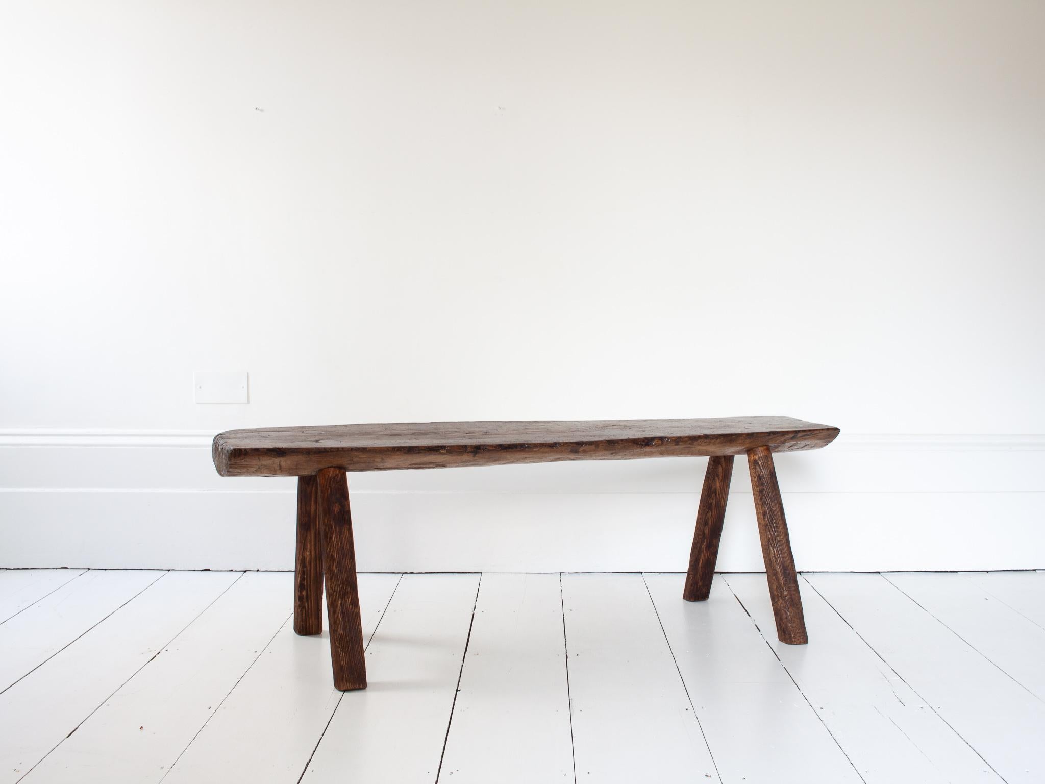 Rustic, Primitive, Wabi Sabi, Antique, Naive Vintage Bench, England, c19th Century.
 
A rustic, primitive bench.  Sitting on four slightly splayed chamfered legs and the top formed of solid pine with a great aesthetic.  England, c19th Century.  The