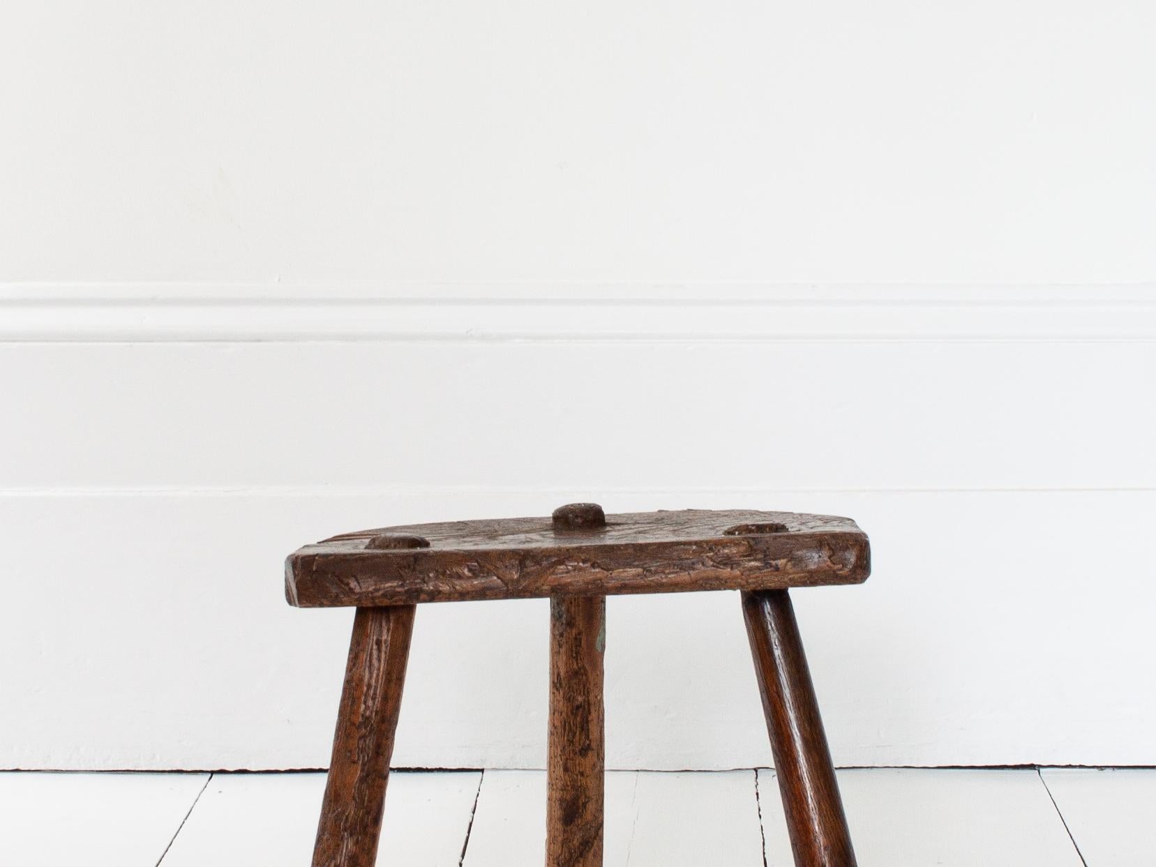 Rustic, Primitive, Wabi Sabi, Antique, Naive Vintage Stool/Table, England, c19th Century.

A rustic stool which would also serve as a side/coffee table.  Sitting on four splayed legs and formed of oak with a great aesthetic.  England, c19th