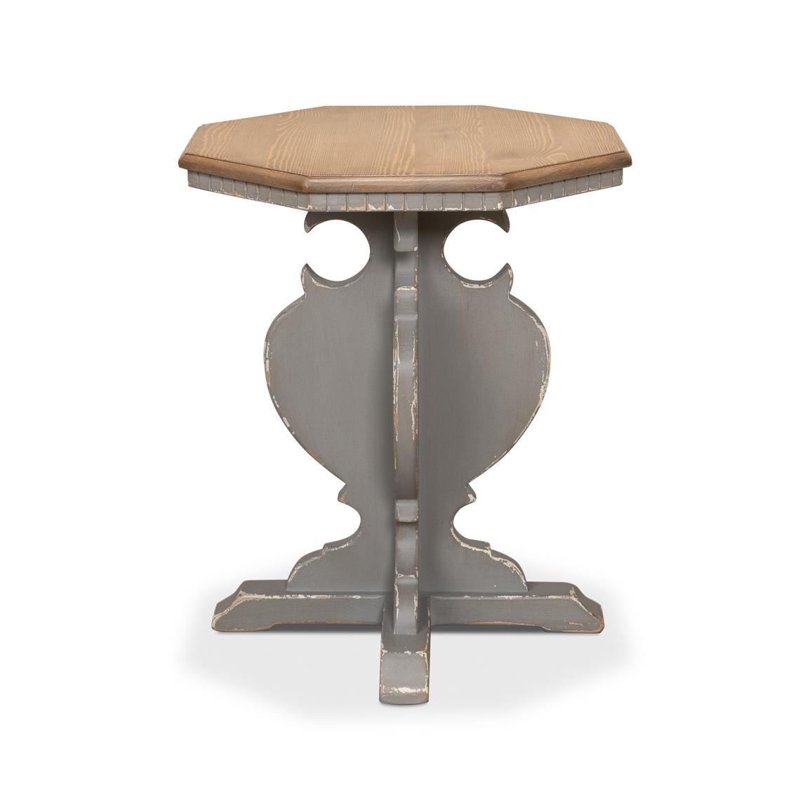 This piece is a conversation starter, marrying the sturdiness of its wooden top with the whimsical elegance of its distressed grey base.

The table's top octagonal surface boasts a natural finish that highlights its rich grain. The base is a work of