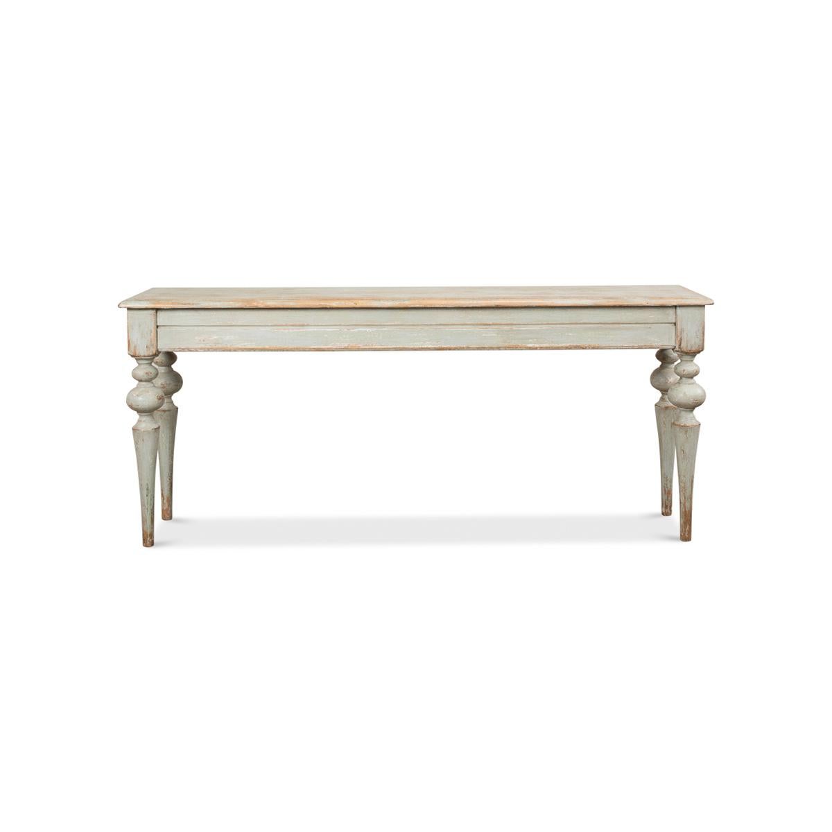 Introducing the charming Rustic provincial sage pine console table, a beautifully crafted piece of furniture that exudes sophistication and rustic elegance. Finished in a rustic antiqued painted sage green. Its molded edge top is a standout feature,
