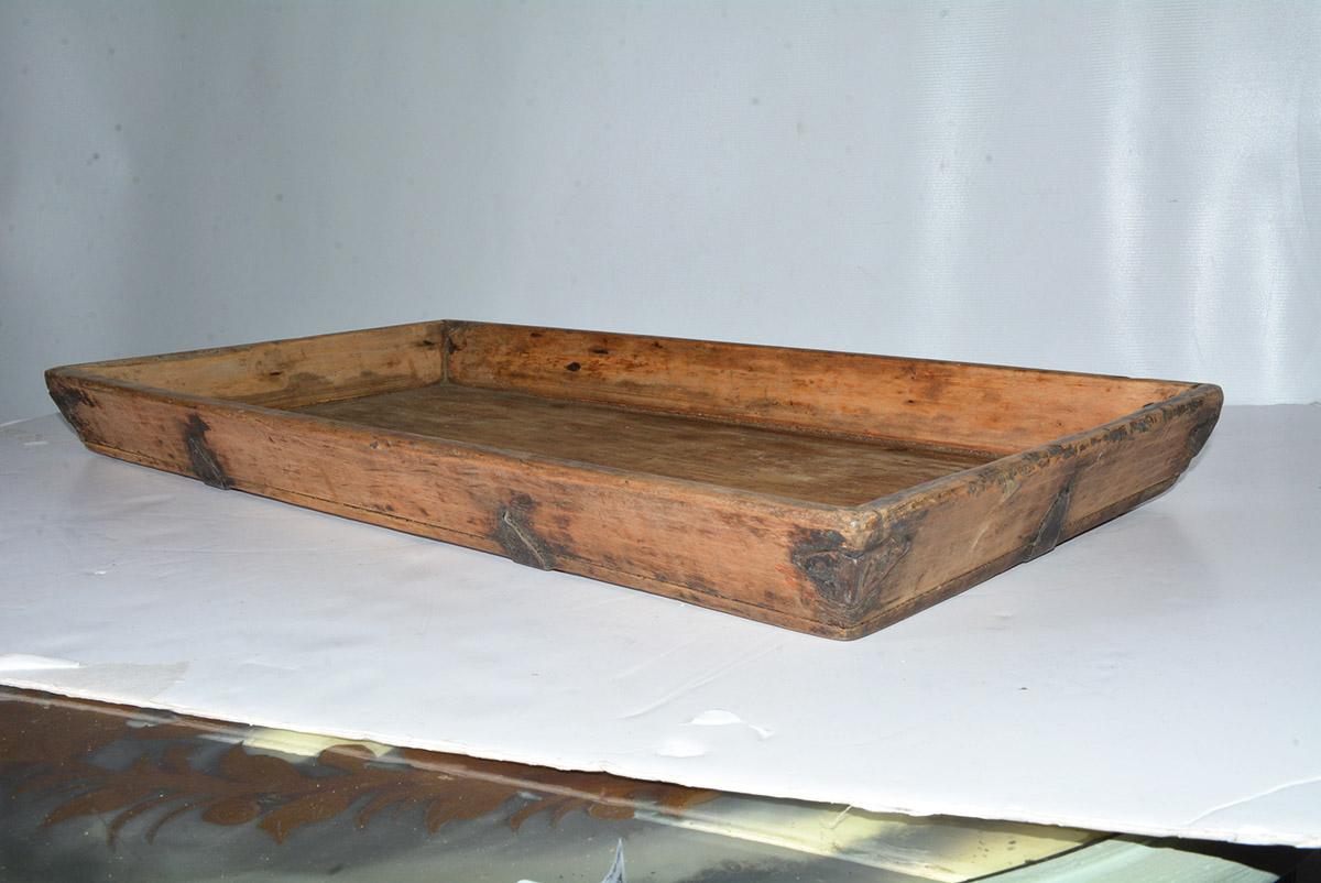 The rustic vintage Chinese country style serving tea tray adds timeless appeal to modern interiors as a sculptural object, coffee table catch-all or serving platter. Well used in time but has wonderful wood patina adding character and style!