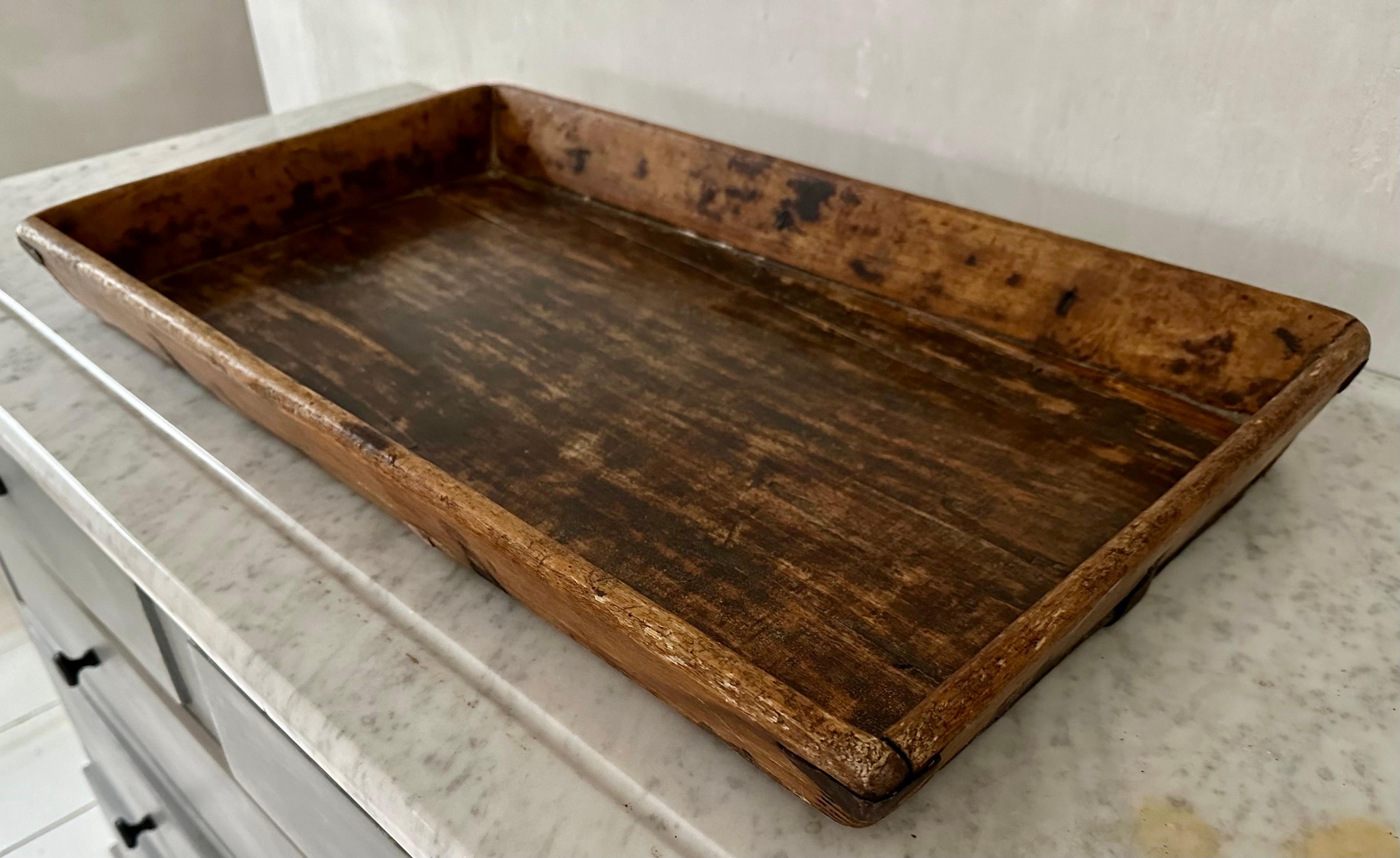 The organic rustic vintage Chinese country style serving tray, once a common item in most households can now add timeless appeal to modern interiors as a sculptural object, coffee table catch-all or serving platter. Well used in time but has