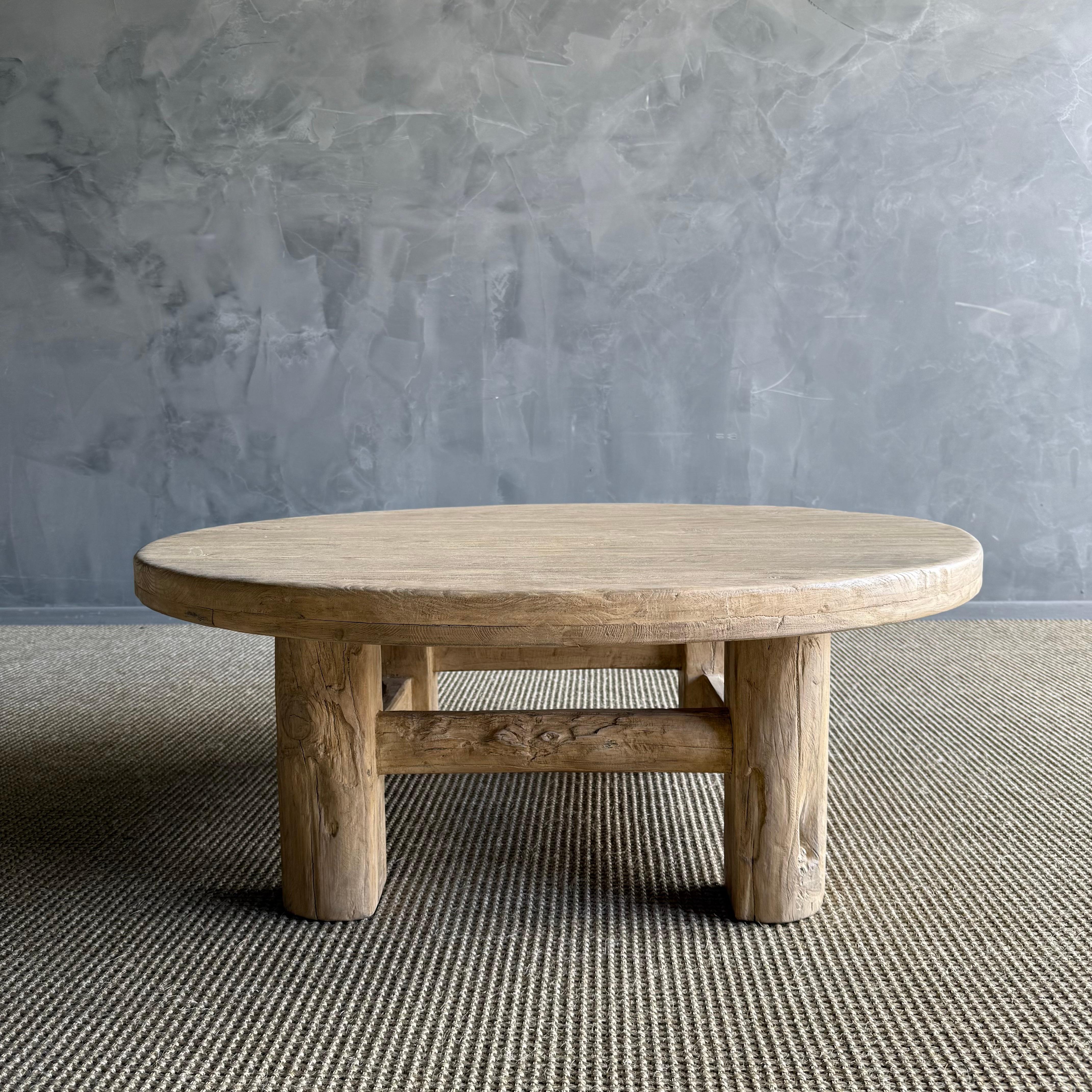 Introducing a reclaimed elm wood coffee table, exquisitely crafted with unique details and imbued with wabi sabi reclaimed elegance. This one-of-a-kind piece showcases the beauty of imperfections, celebrating the natural charm and character of