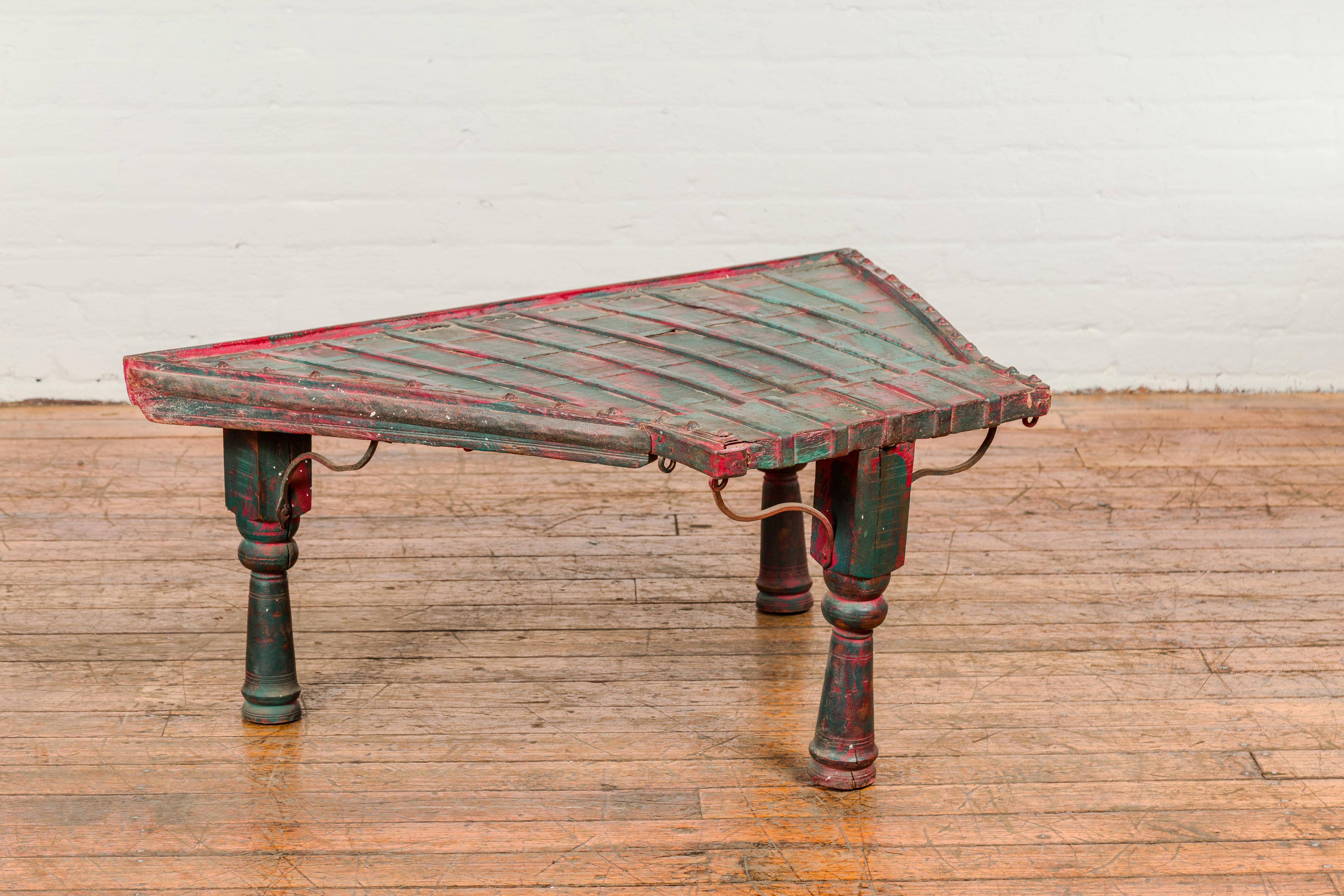 19th Century Rustic Red and Green Coffee Table with Trapezoidal Top and Iron Stretchers For Sale