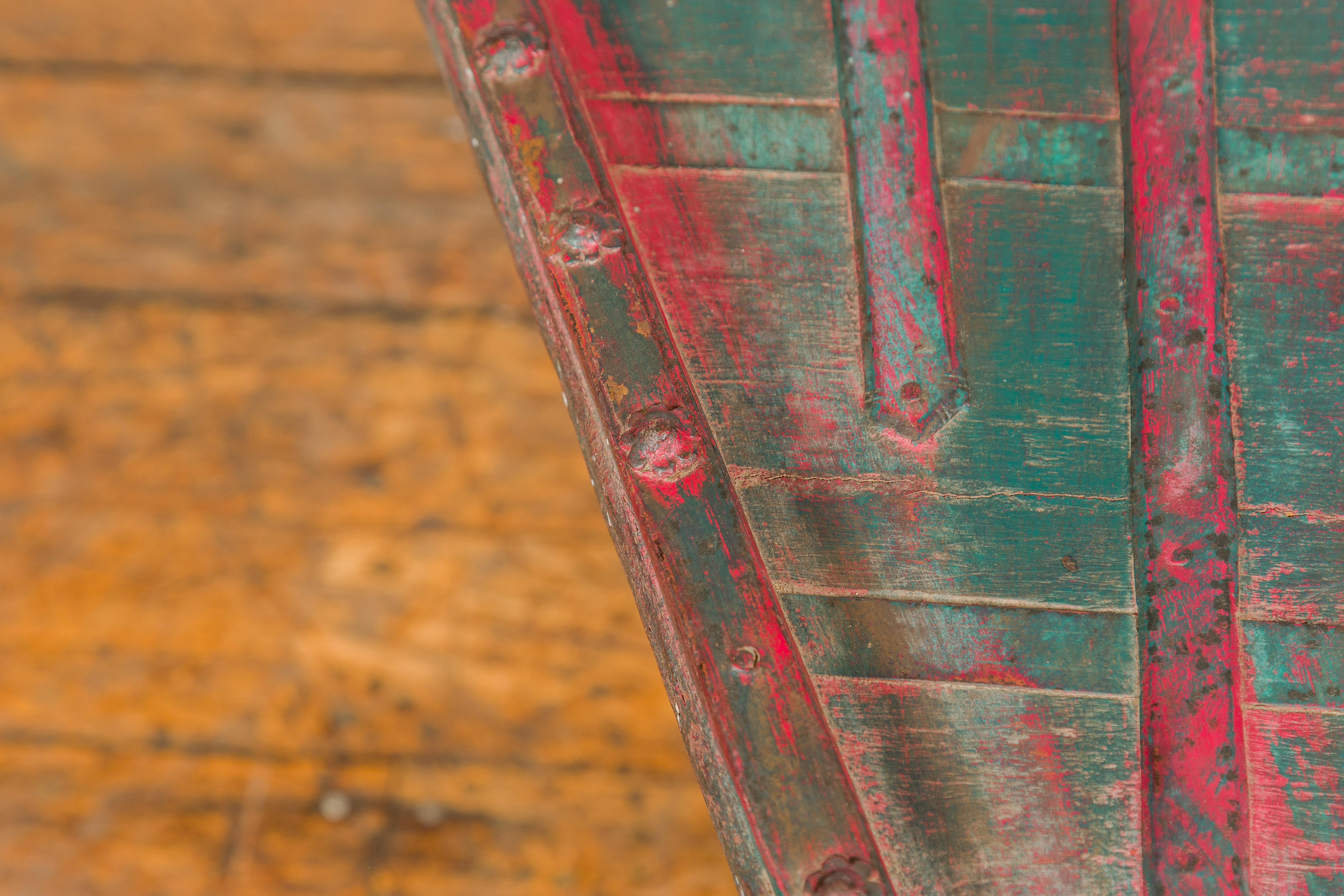 Rustic Red and Green Coffee Table with Trapezoidal Top and Iron Stretchers For Sale 2