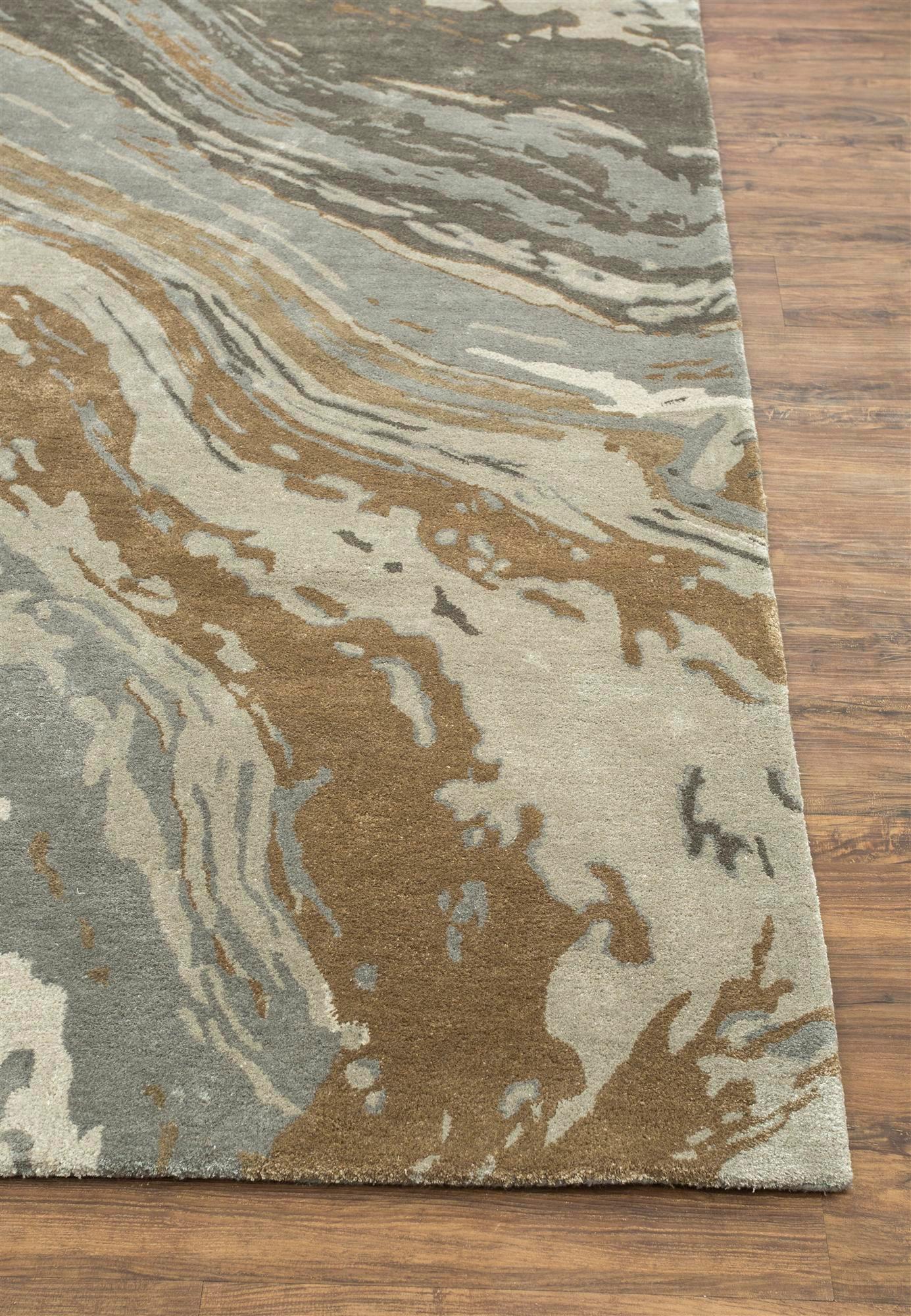 Crafted with meticulous attention to detail, this luxury rug from our Genesis collection embodies a fusion of contemporary elegance and timeless allure. Its design features a series of gracefully flowing lines, reminiscent of the gentle ripples and