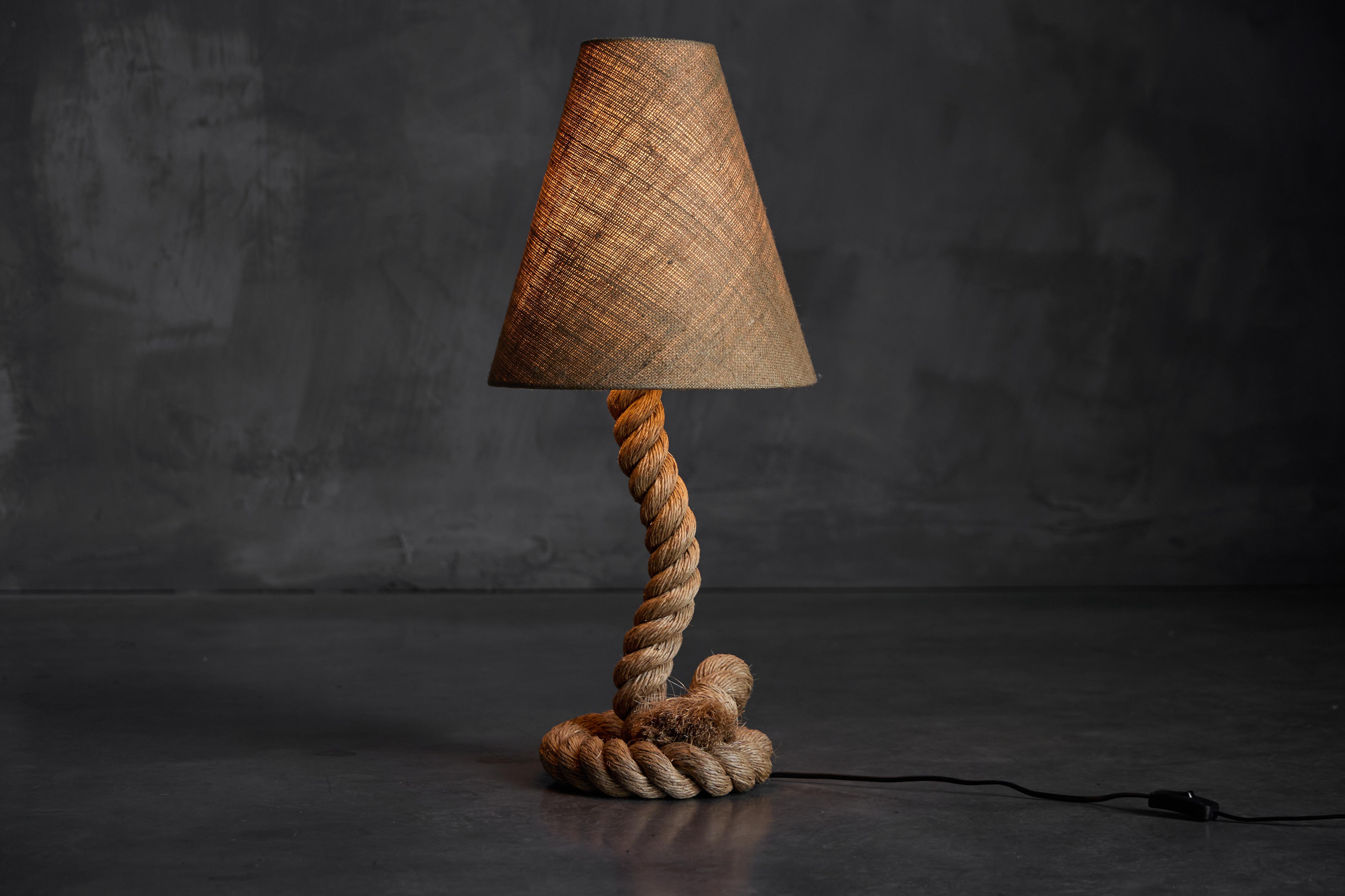 This handcrafted rope table lamp adds warmth and character to any space with its knotted base and natural jute shade. Its organic texture brings a rustic yet elegant touch, perfect for side tables, consoles, or nightstands. Ideal for farmhouse or