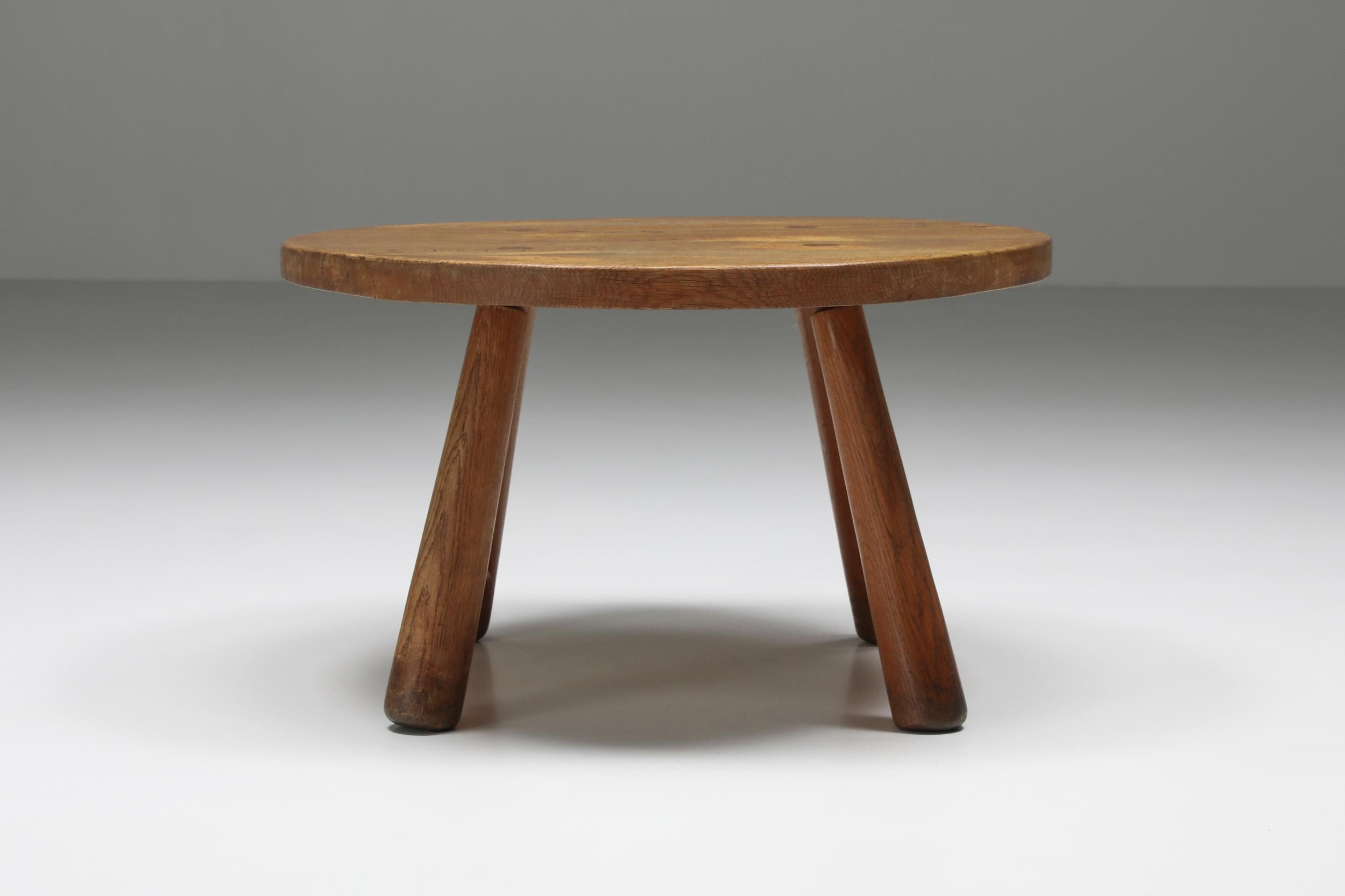 Rustic; round coffee table; Mid-Century Modern; 1950's; minimalist

Would fit well in an Axel Vervoordt style interior.
A very timeless piece with a beautifully rounded tabletop and legs.