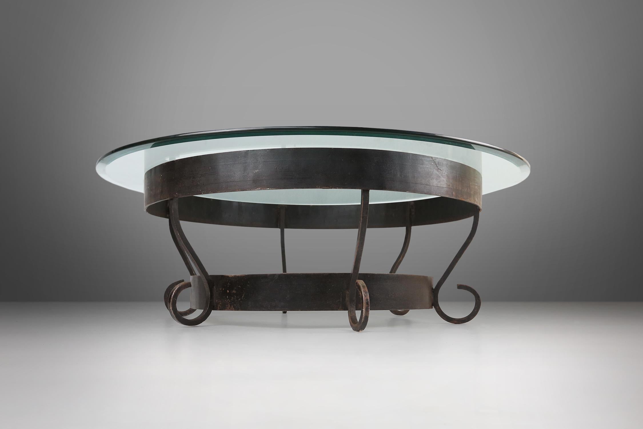 Rustic round coffee table with wrought iron base and glass top, France, 1930s For Sale 4