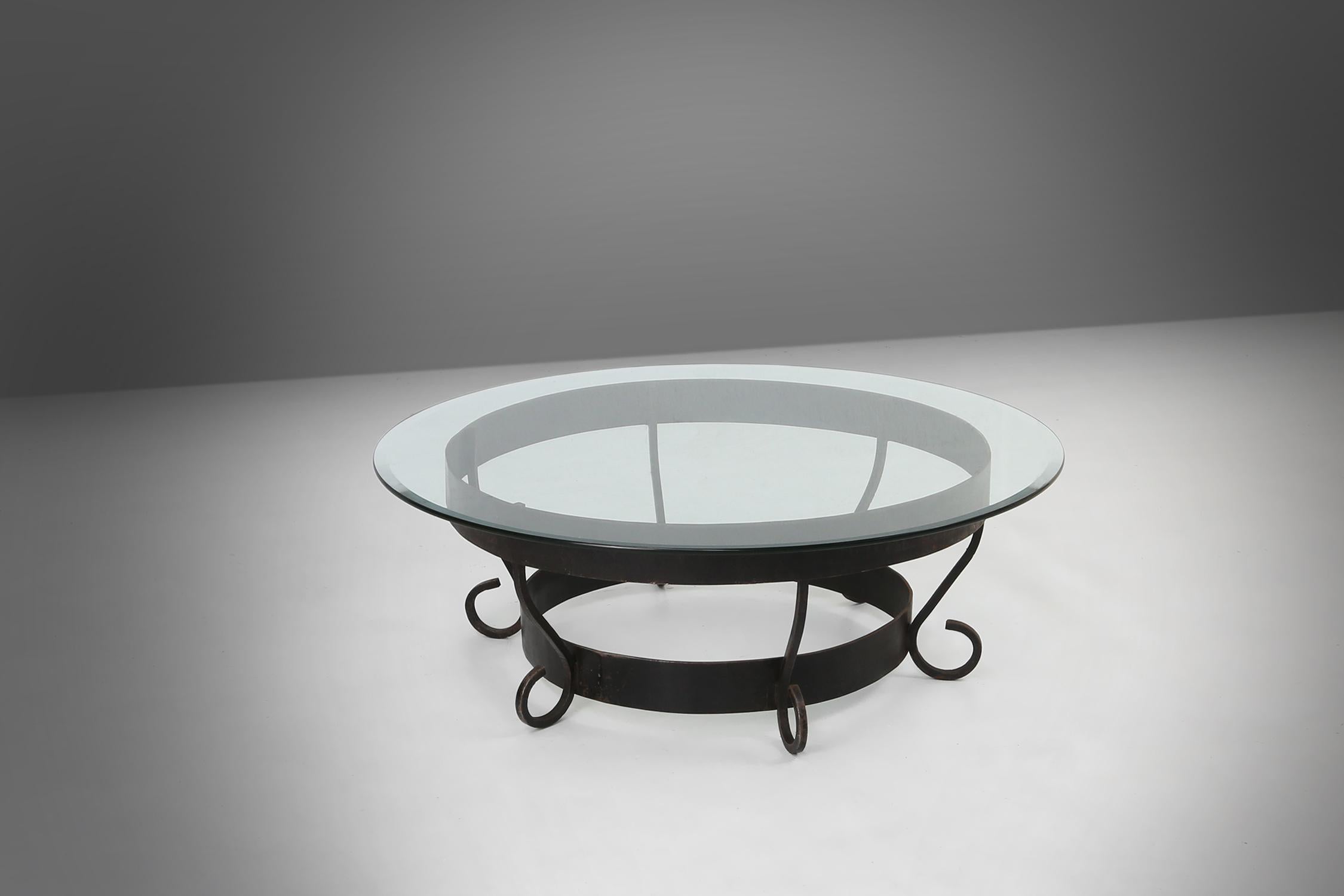 Rustic round coffee table with wrought iron base and glass top, France, 1930s For Sale 2